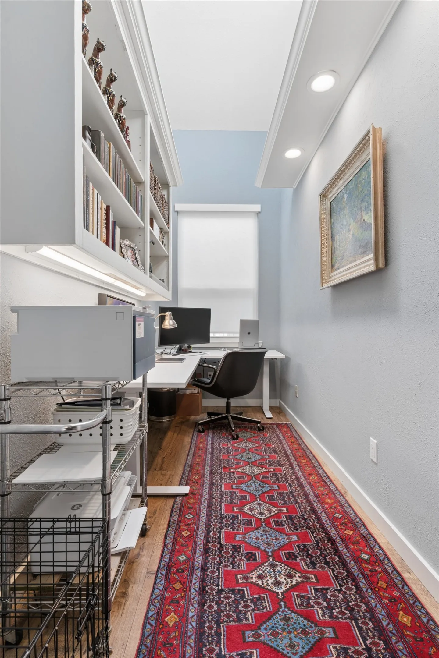 View from the dining, built-in bookcases, custom power operated desk remains with the house ..