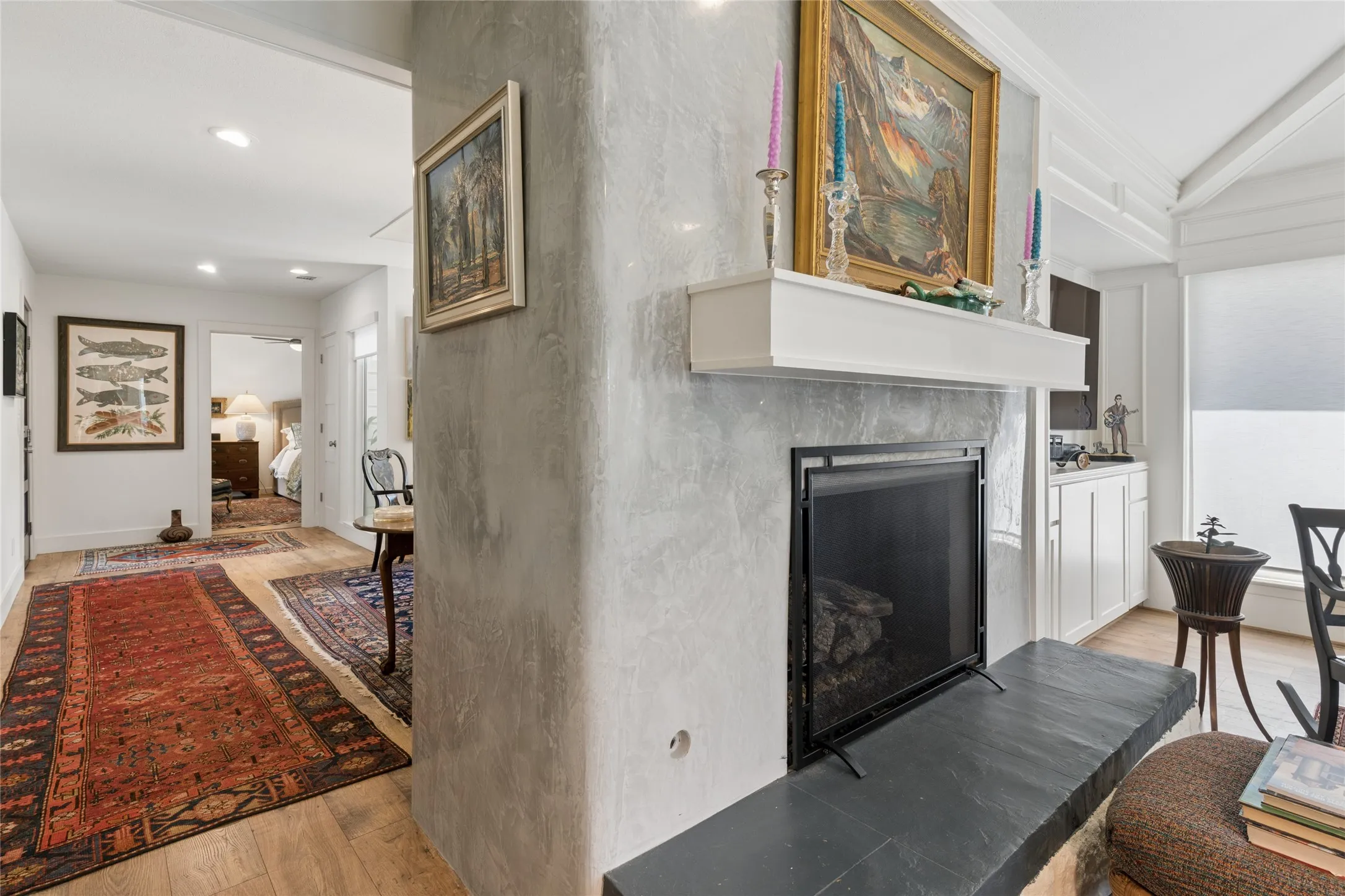 Looking to the front hall, Venetian plaster fireplace surround