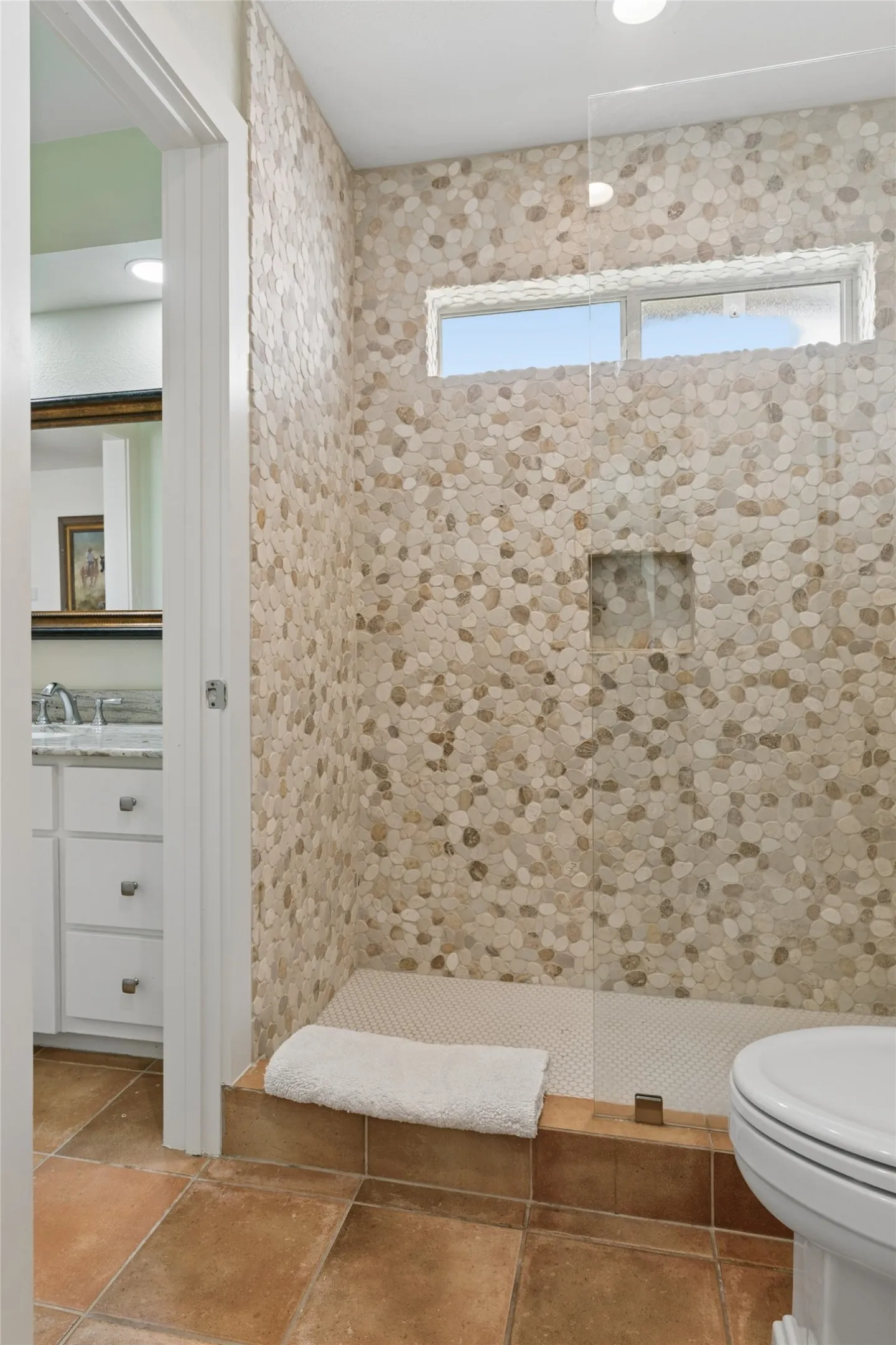 Freshly updated shower with frameless glass