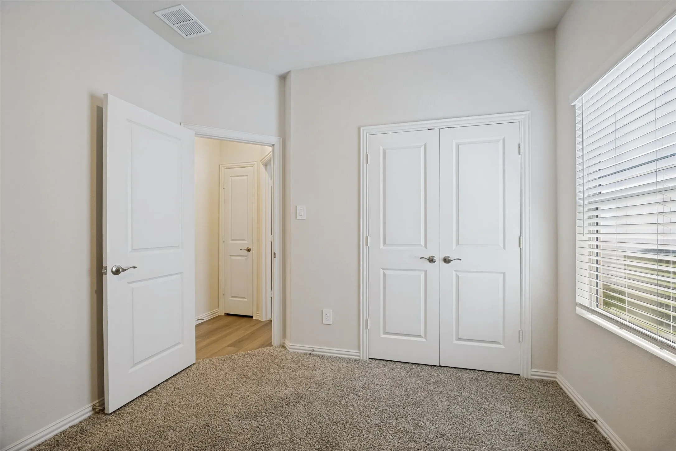 Bedroom #3 also has its own closet and carpeted flooring