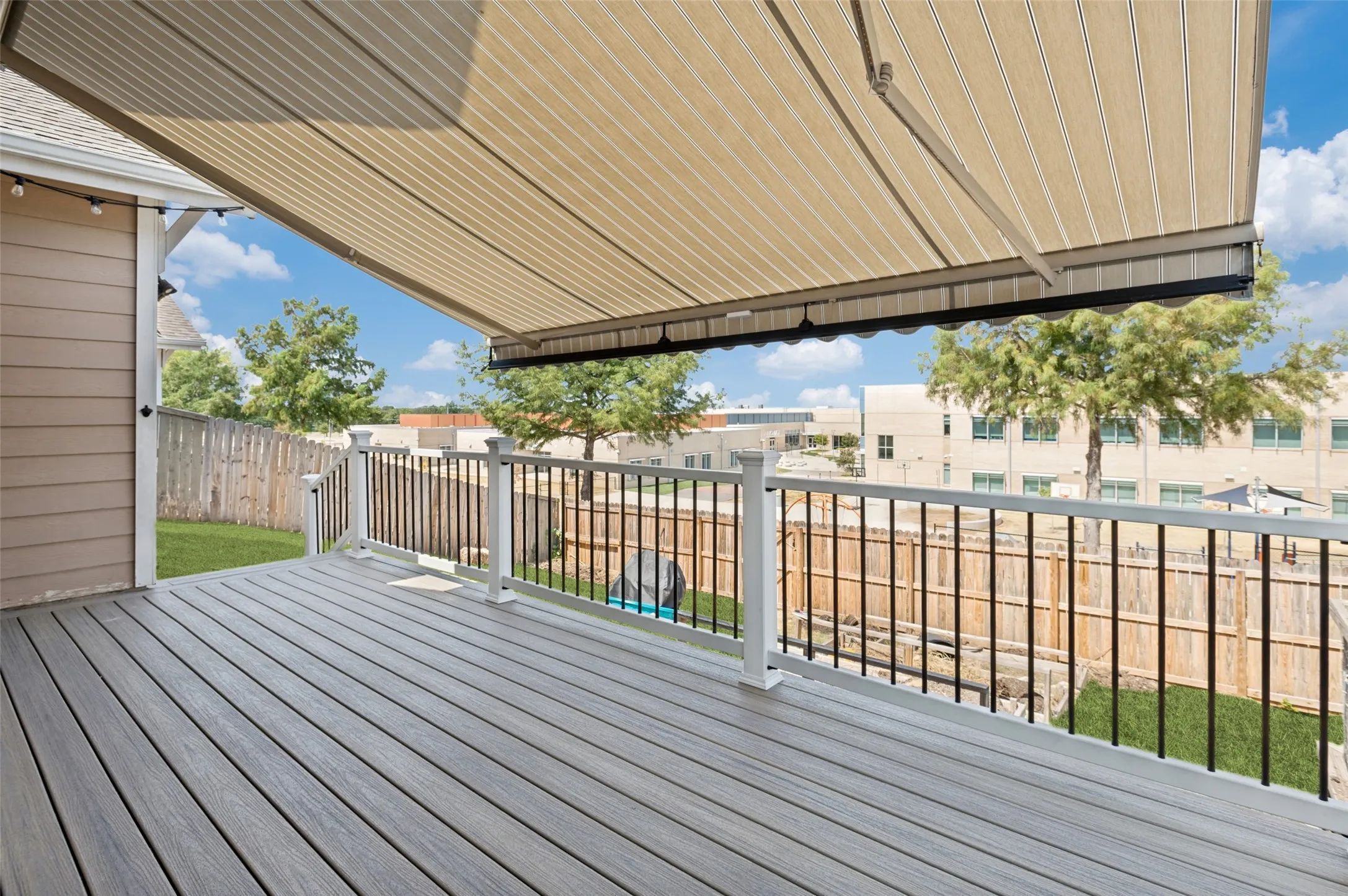 Retractable awning over the back patio