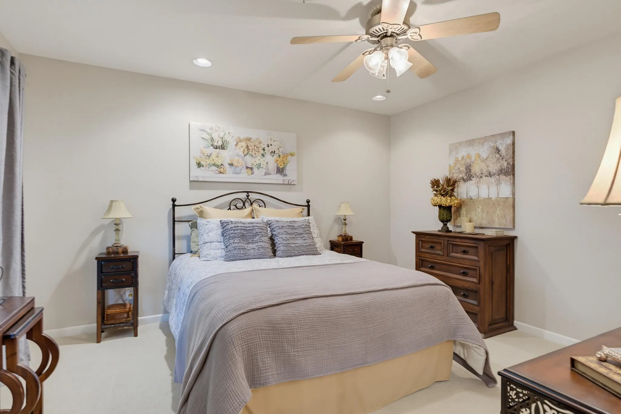 Recessed lighting, ceiling fan, carpeting, and light-colored walls