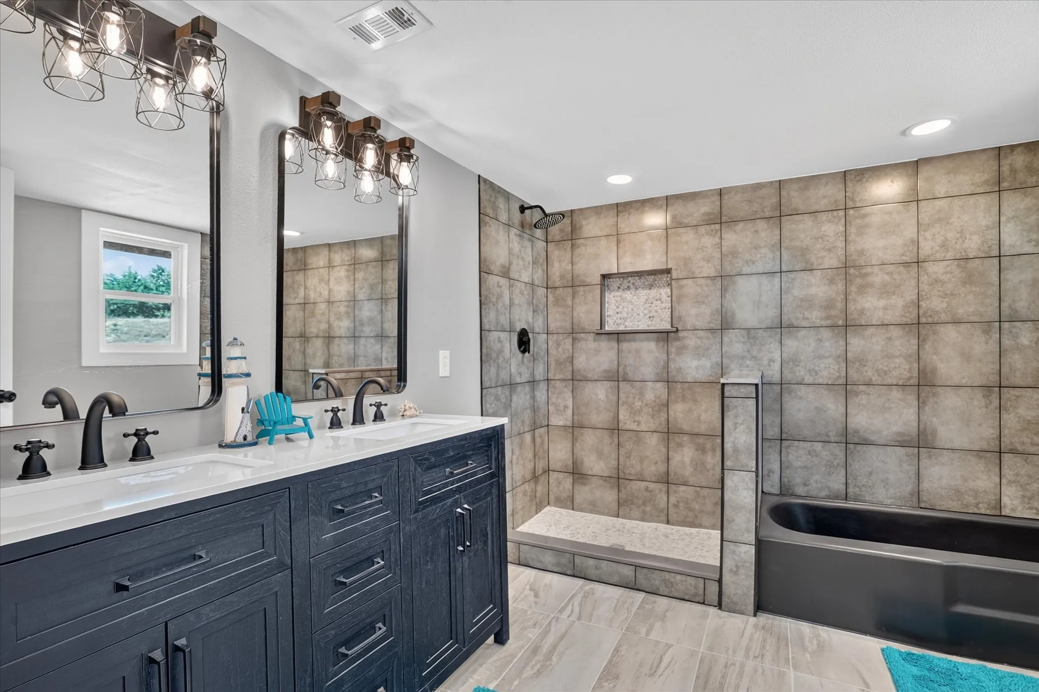 Dual vanity with matte black fixtures and under-sink storage