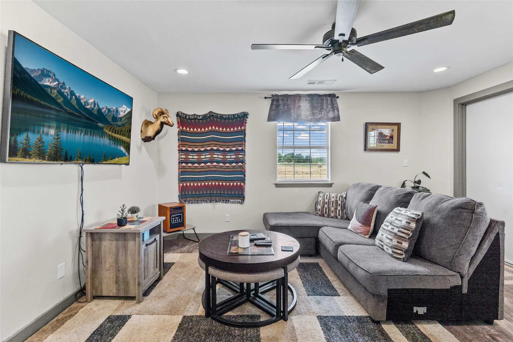 Recessed lighting, ceiling fan, window with blinds, and white walls