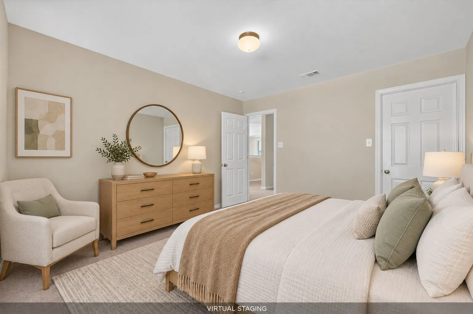 The front secondary bedroom features a nice-sized walk-in closet and enjoys natural shade from the mature front yard tree.