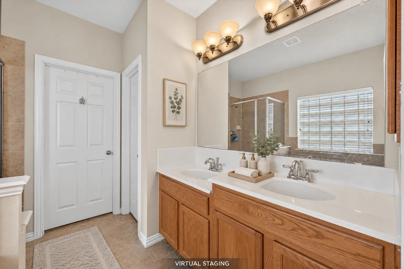 Primary bath features a garden tub, separate glass-enclosed shower with built-in seat, dual vanity with bowl sinks, walk-in closet & private lavatory.