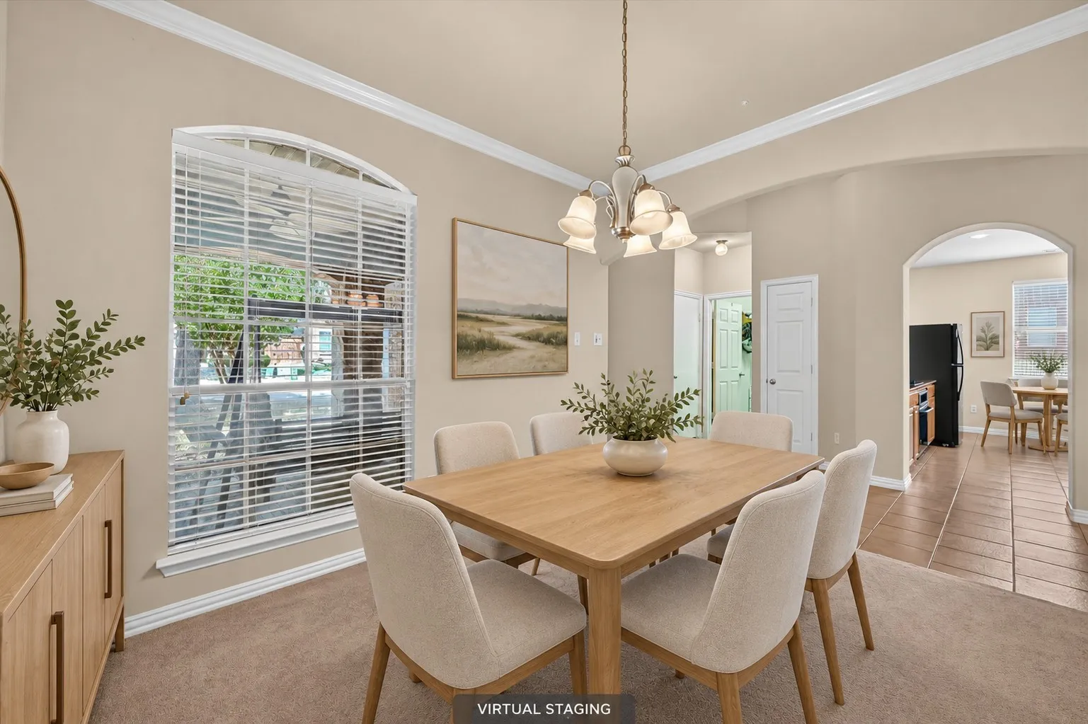 Front dining area conveniently located near both the kitchen and living room, with a view of the welcoming front porch.