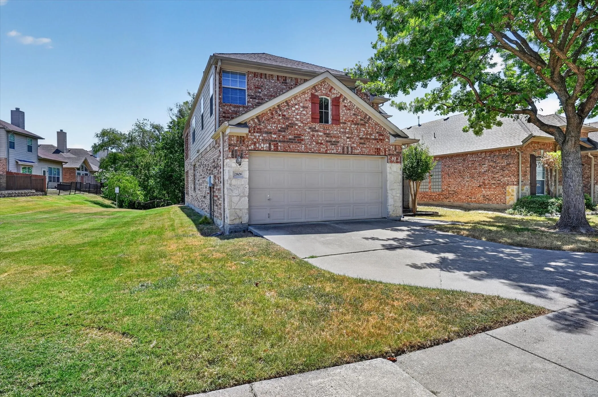 Greenbelt along the side and back of home provides added privacy and open space.