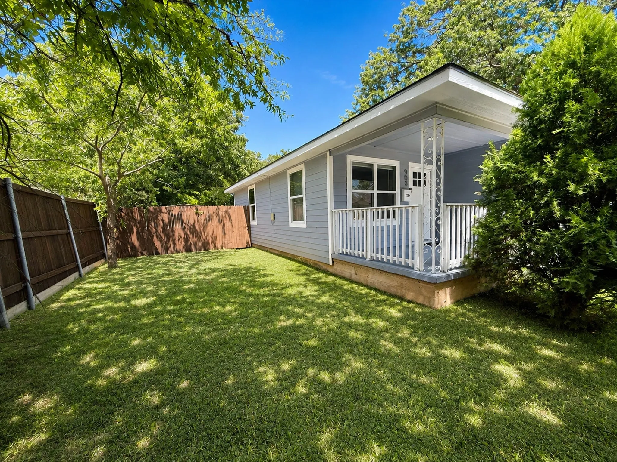 Digitally enhanced to illustrate potential lawn appearance. Grass shown is not currently present