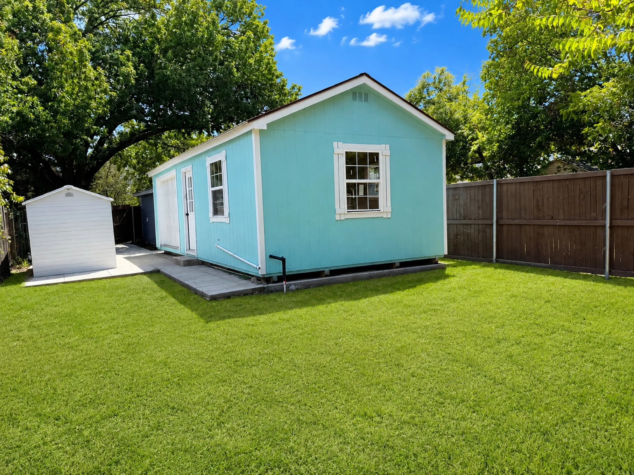 Digitally enhanced to illustrate potential lawn appearance. Grass shown is not currently present