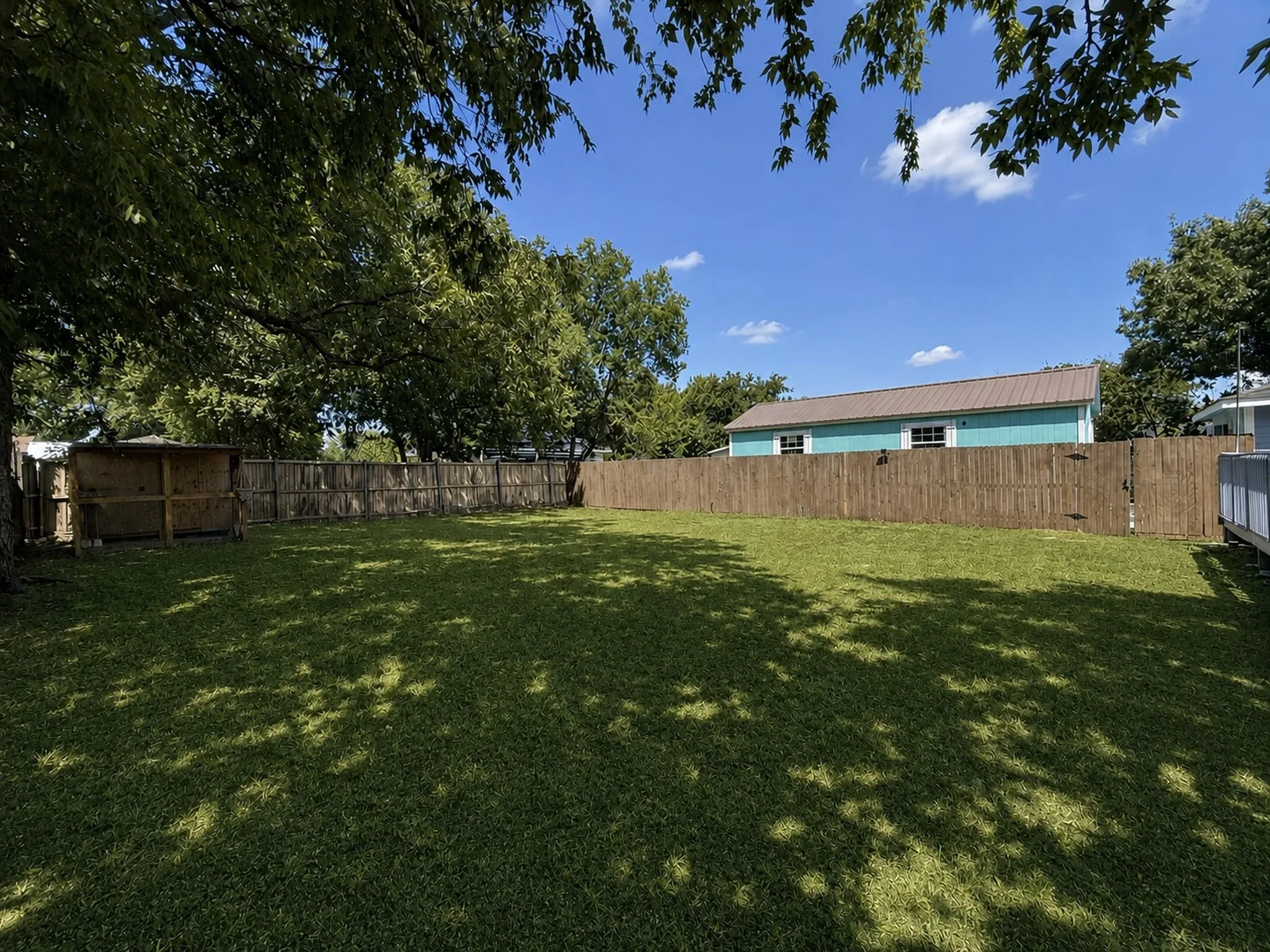 Digitally enhanced to illustrate potential lawn appearance. Grass shown is not currently present