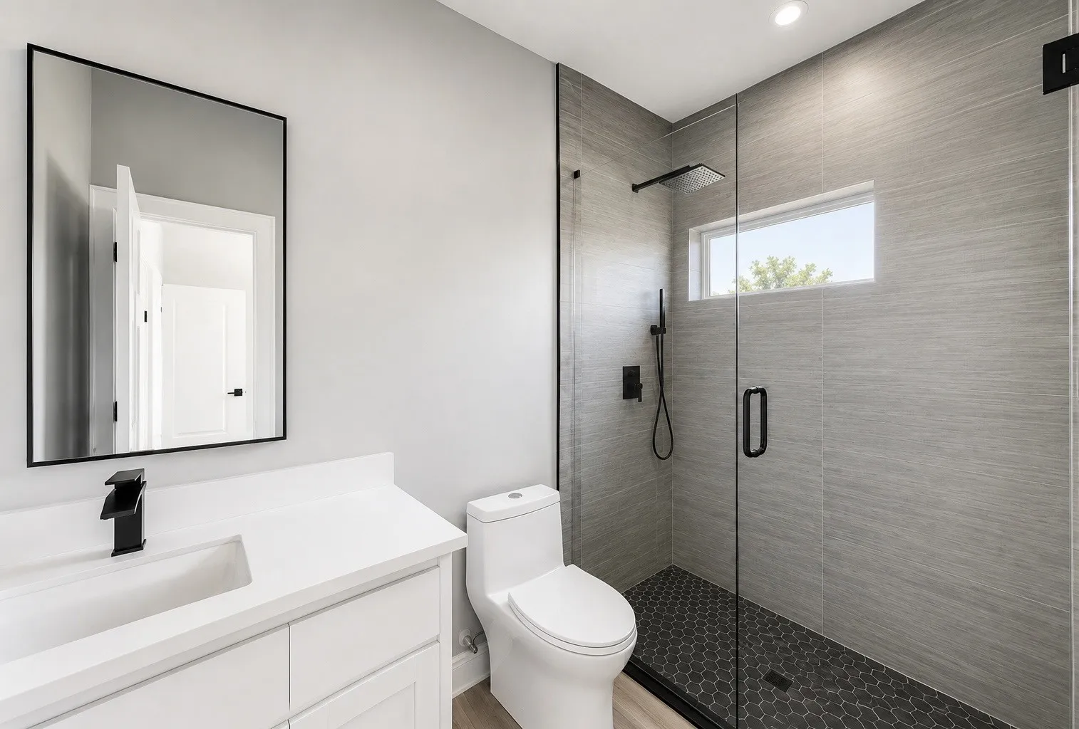 White vanity with integrated sink and matte black faucet