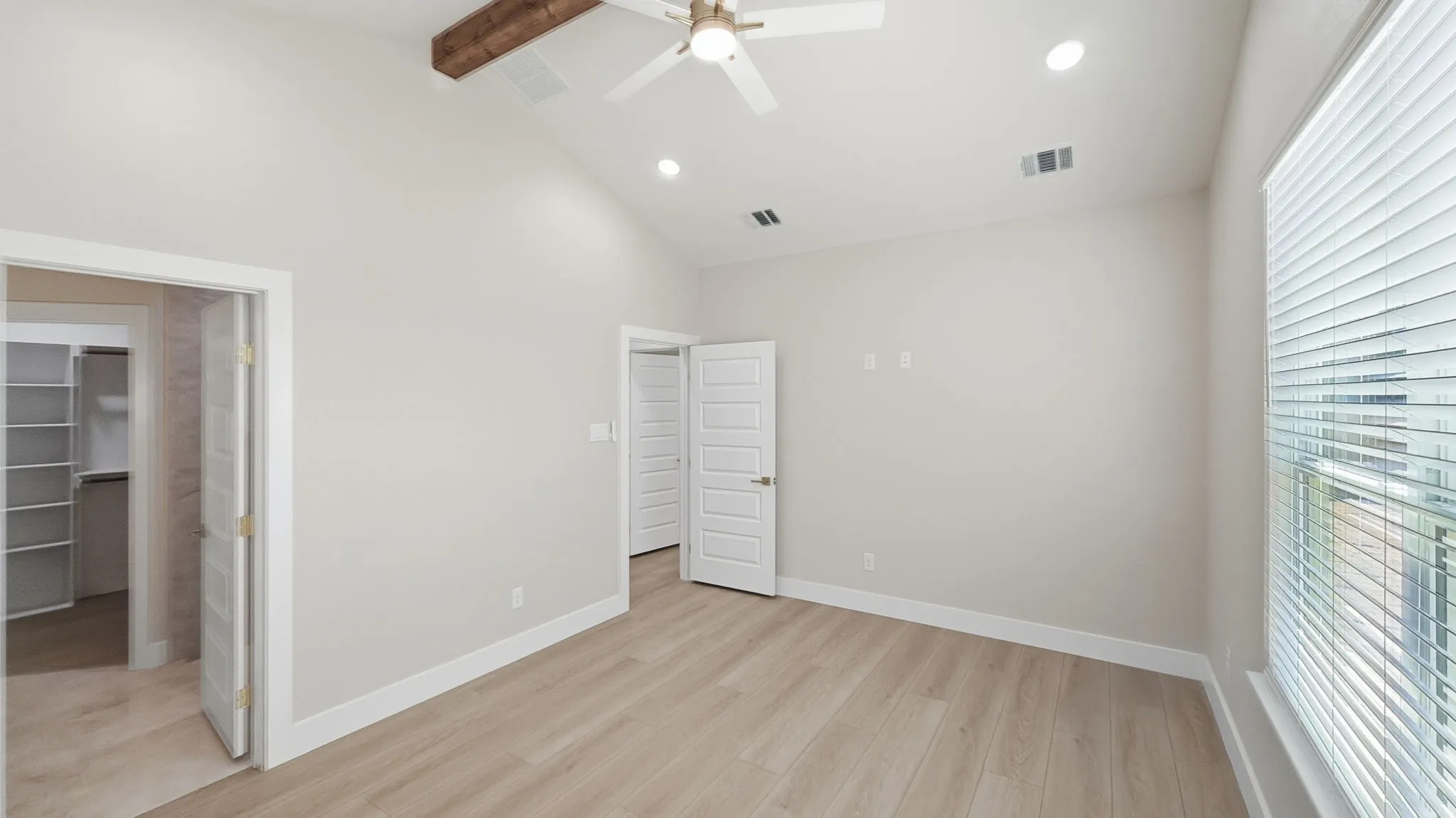 Primary bedroom with primary bath to left