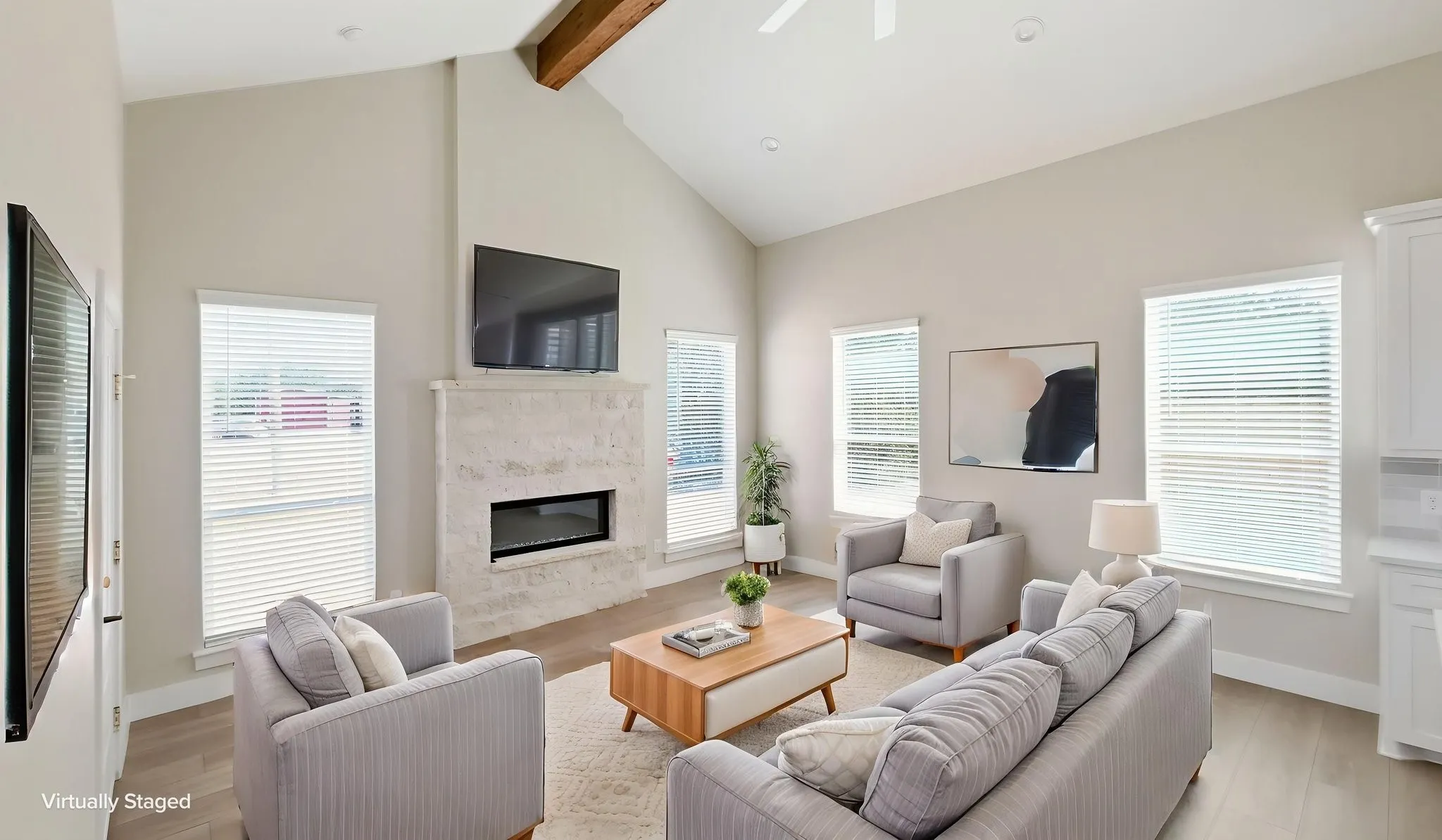 Large and open living room with fireplace