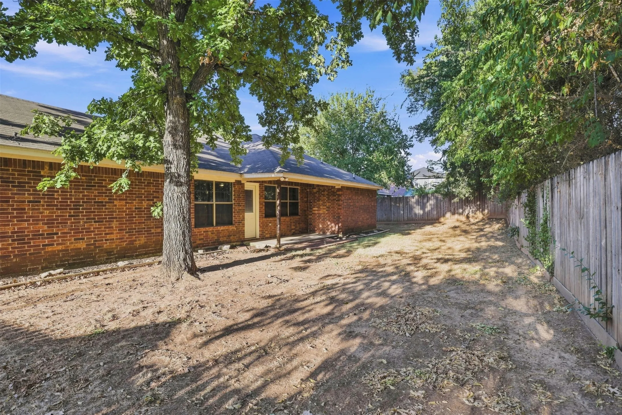 fenced rear yard.