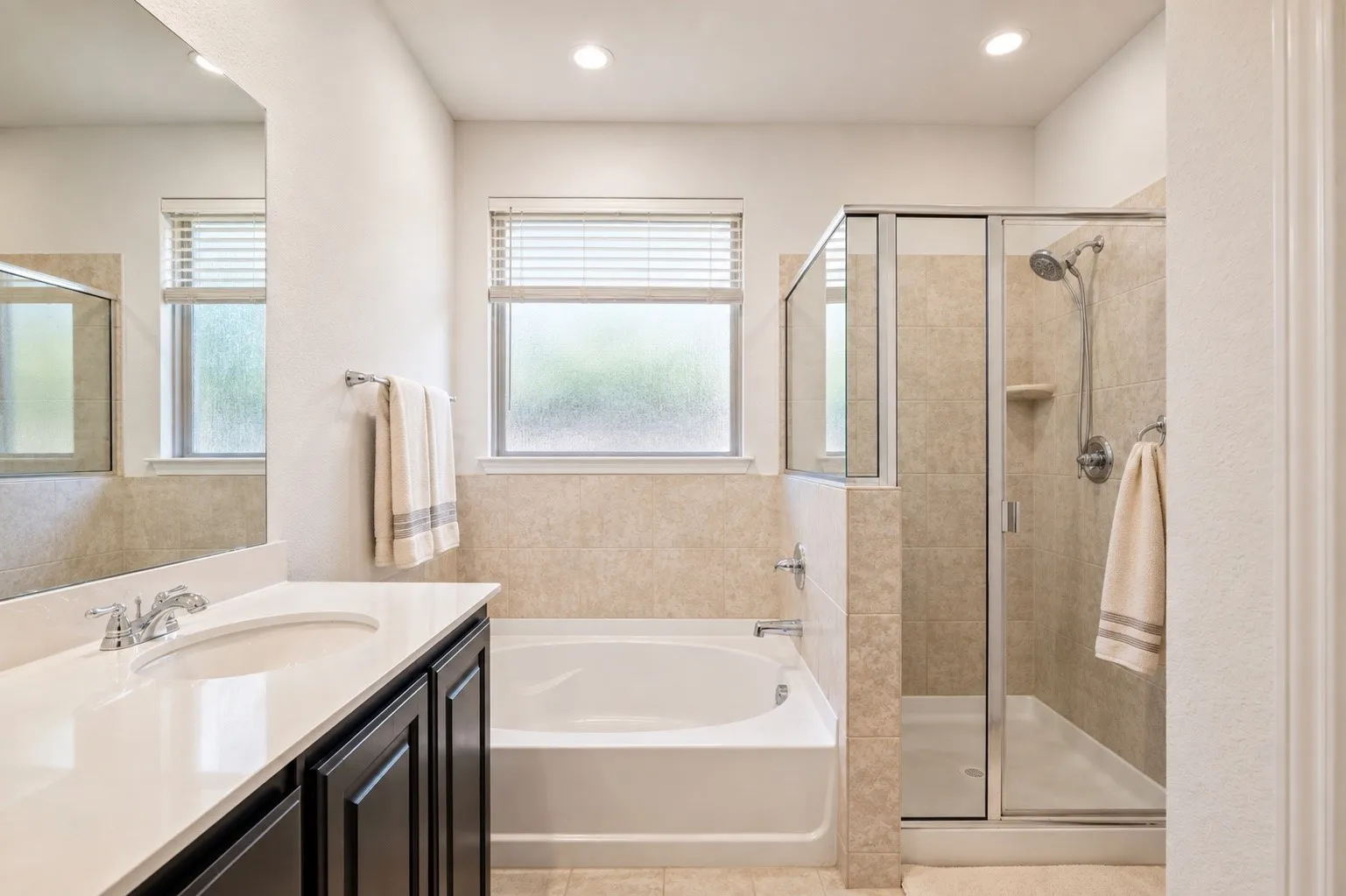 Primary Suite complete with double lavatory.