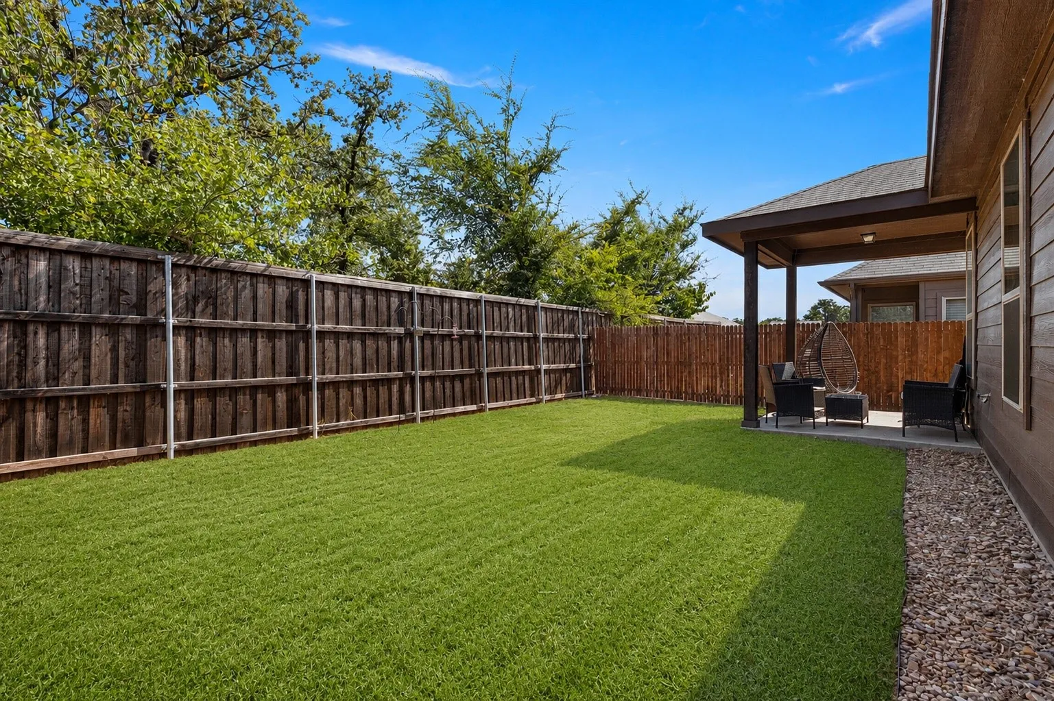 Backyard that backs up to trees.