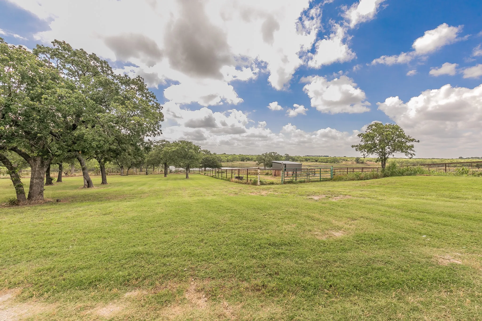 View of yard with a rural view