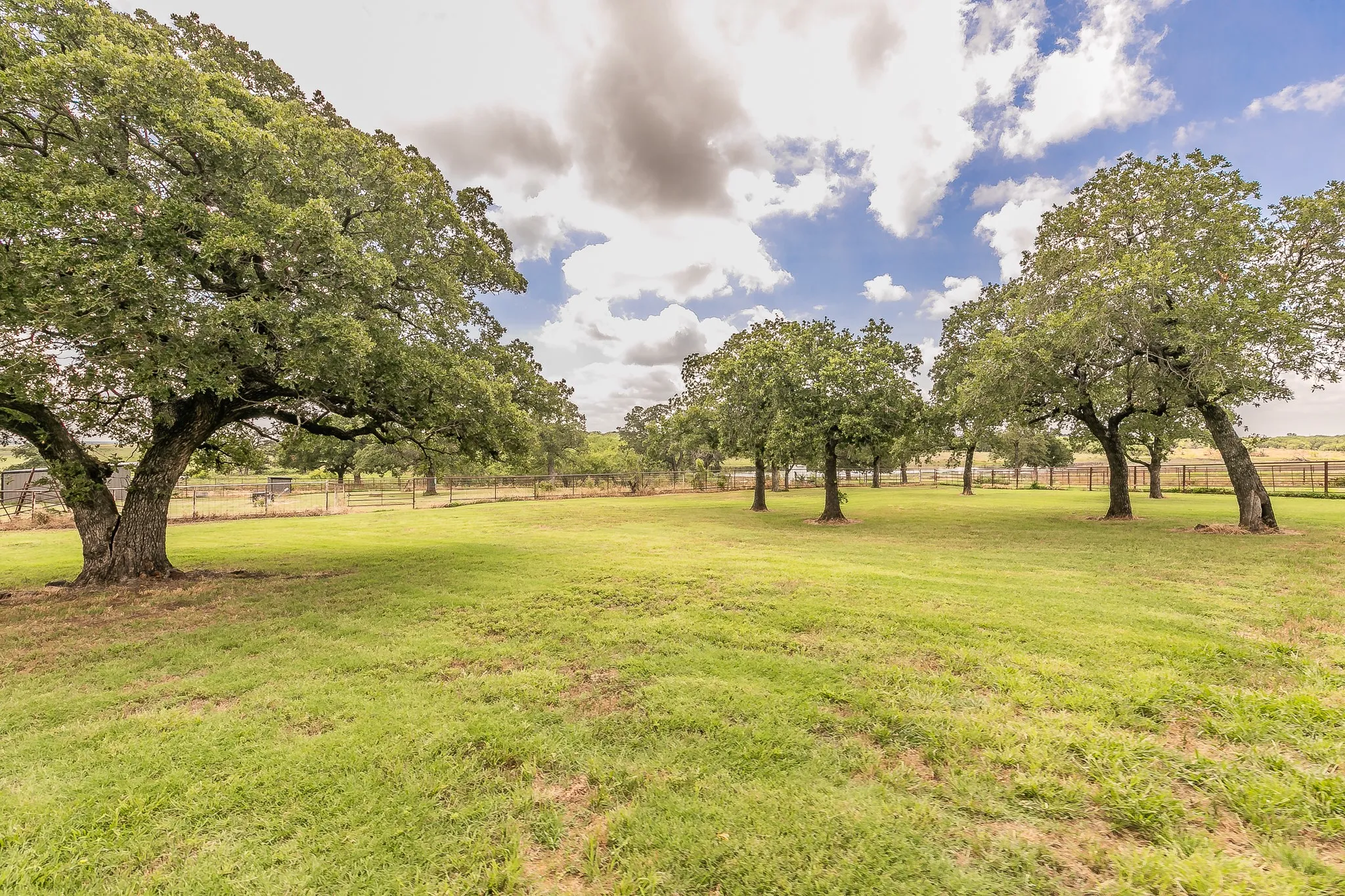 View of yard with a rural view