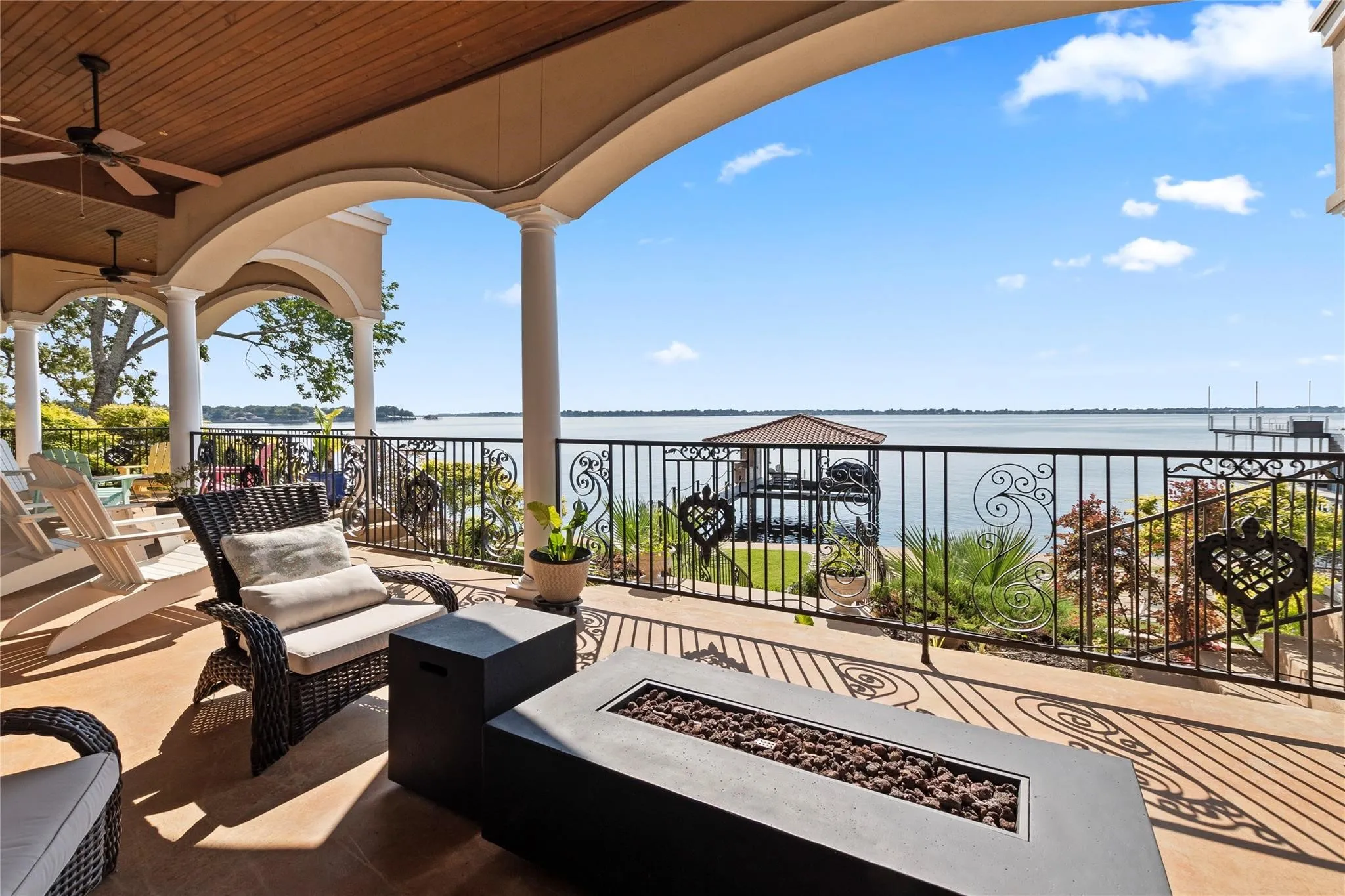 Expansive covered patio running the entire length of the back of the home