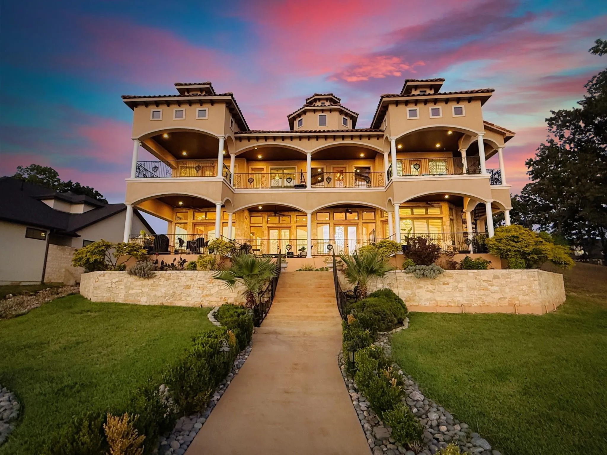 Italian villa–inspired architecture with 94 ft. of open waterfront