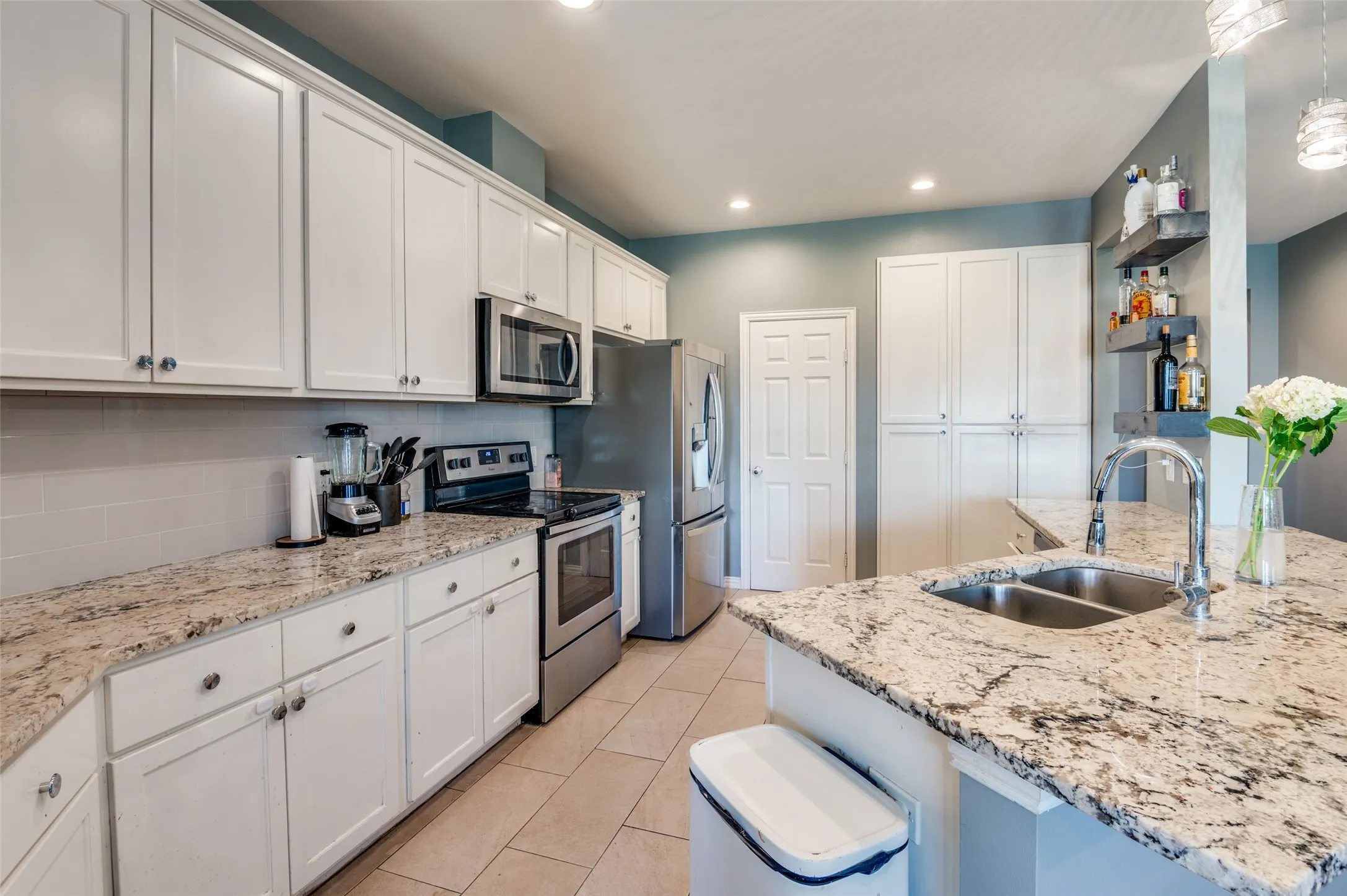 Granite countertops and lots of space to prepare your favorite meals.
