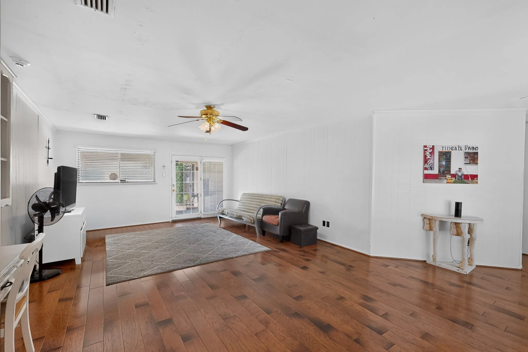 large family room with wood floors