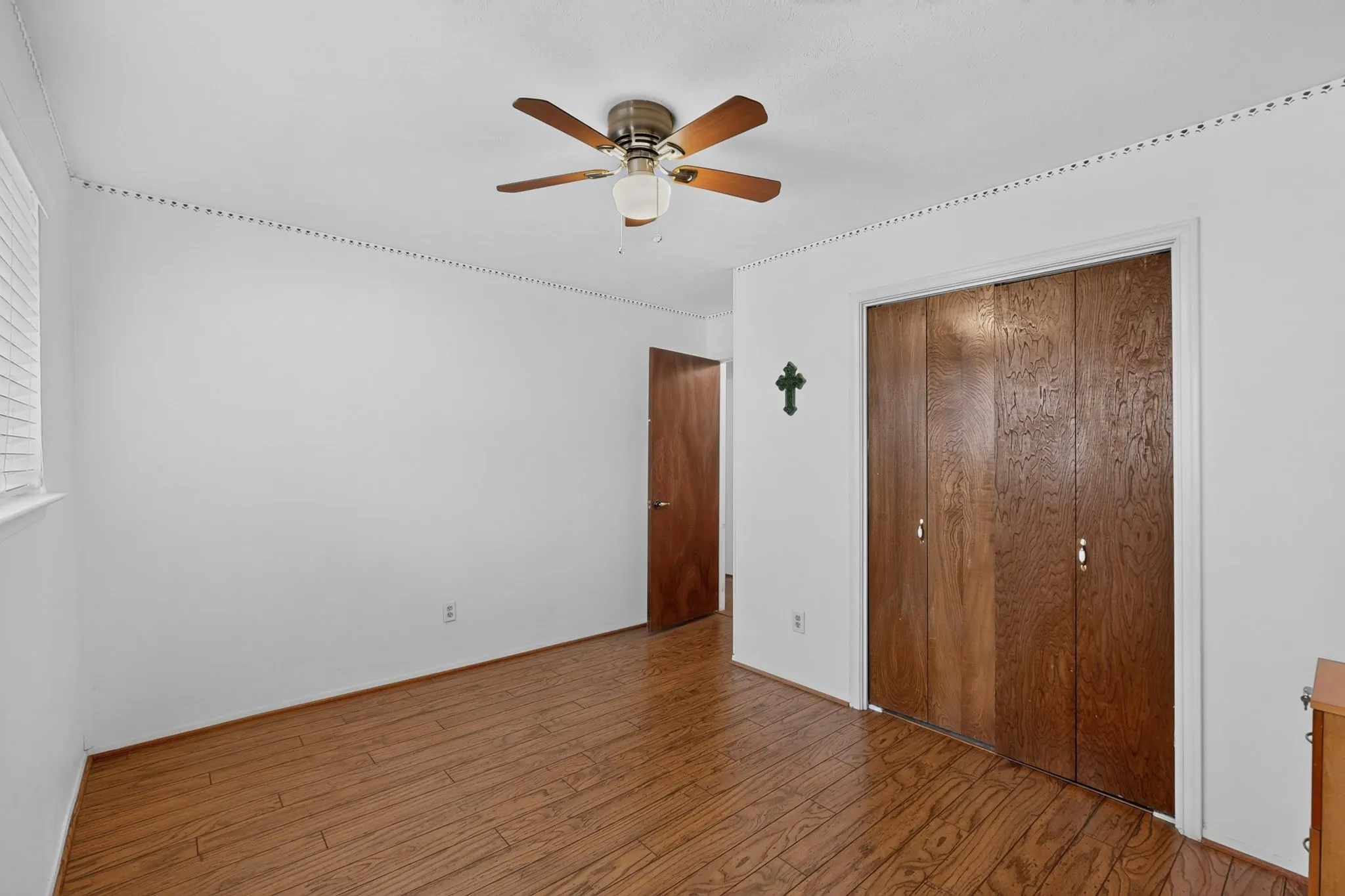 Wood-finish flooring throughout, providing a consistent aesthetic