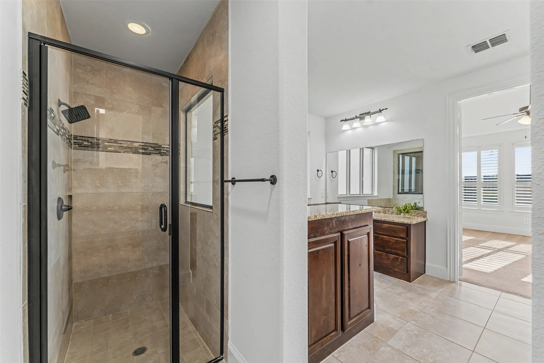 Walk in shower and linen storage