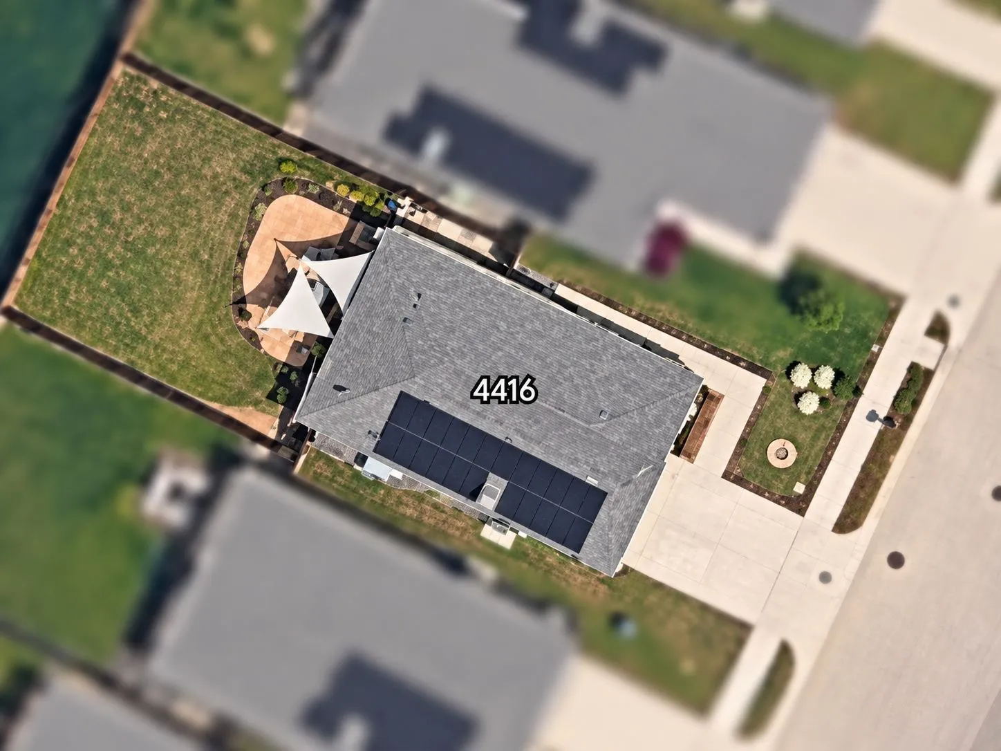 Asphalt shingle roof with solar panels