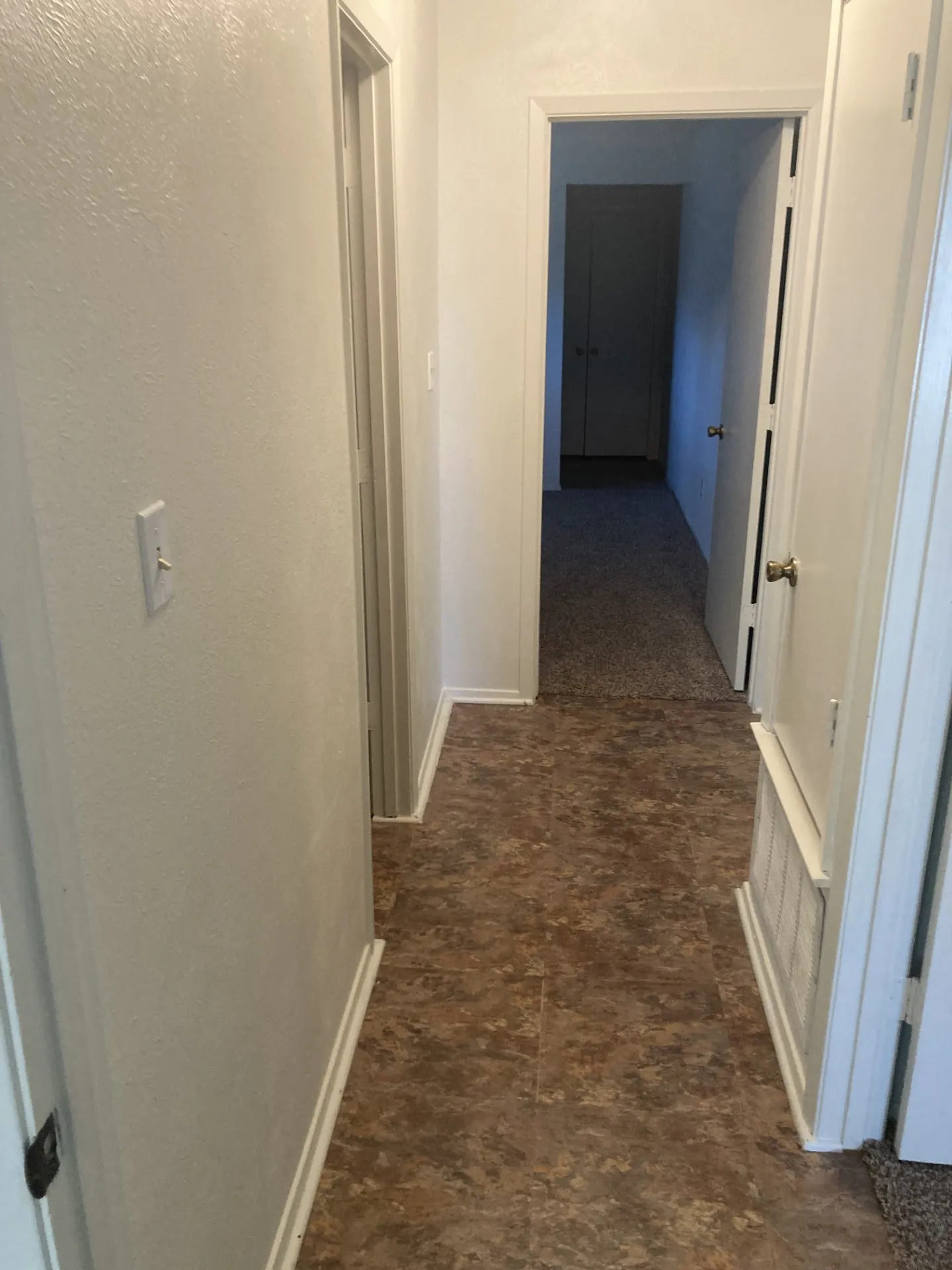 Hallway to primary bedroom.