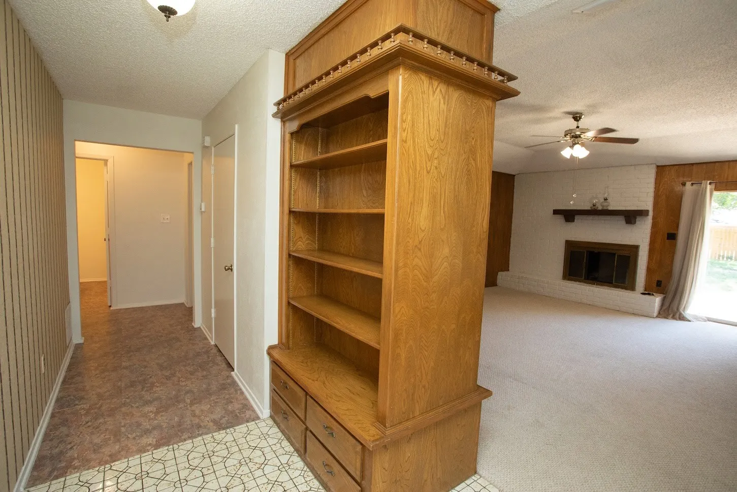 Built-in wooden book shelf.