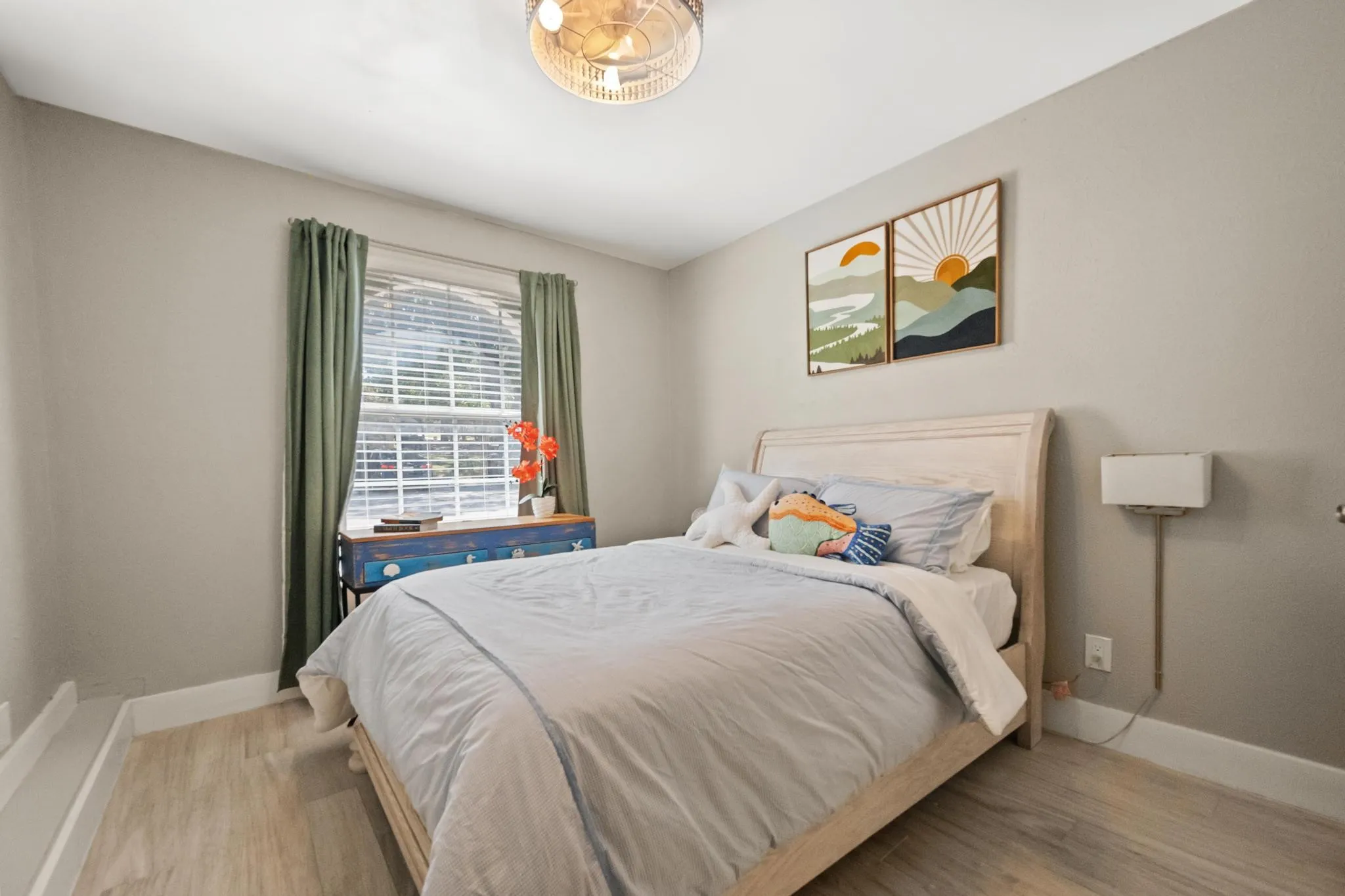 Recessed window with blinds and drapes