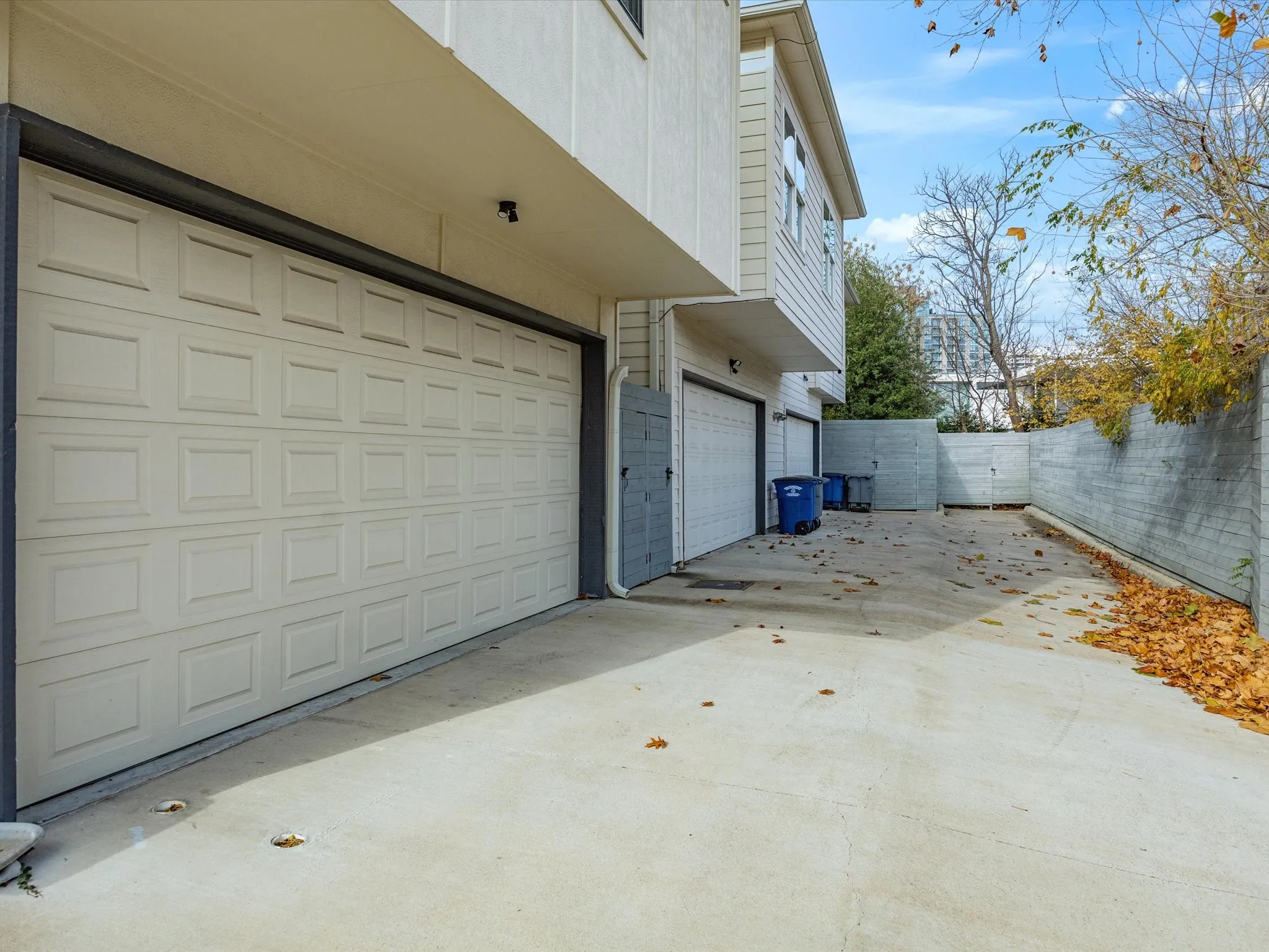 Garage with concrete driveway