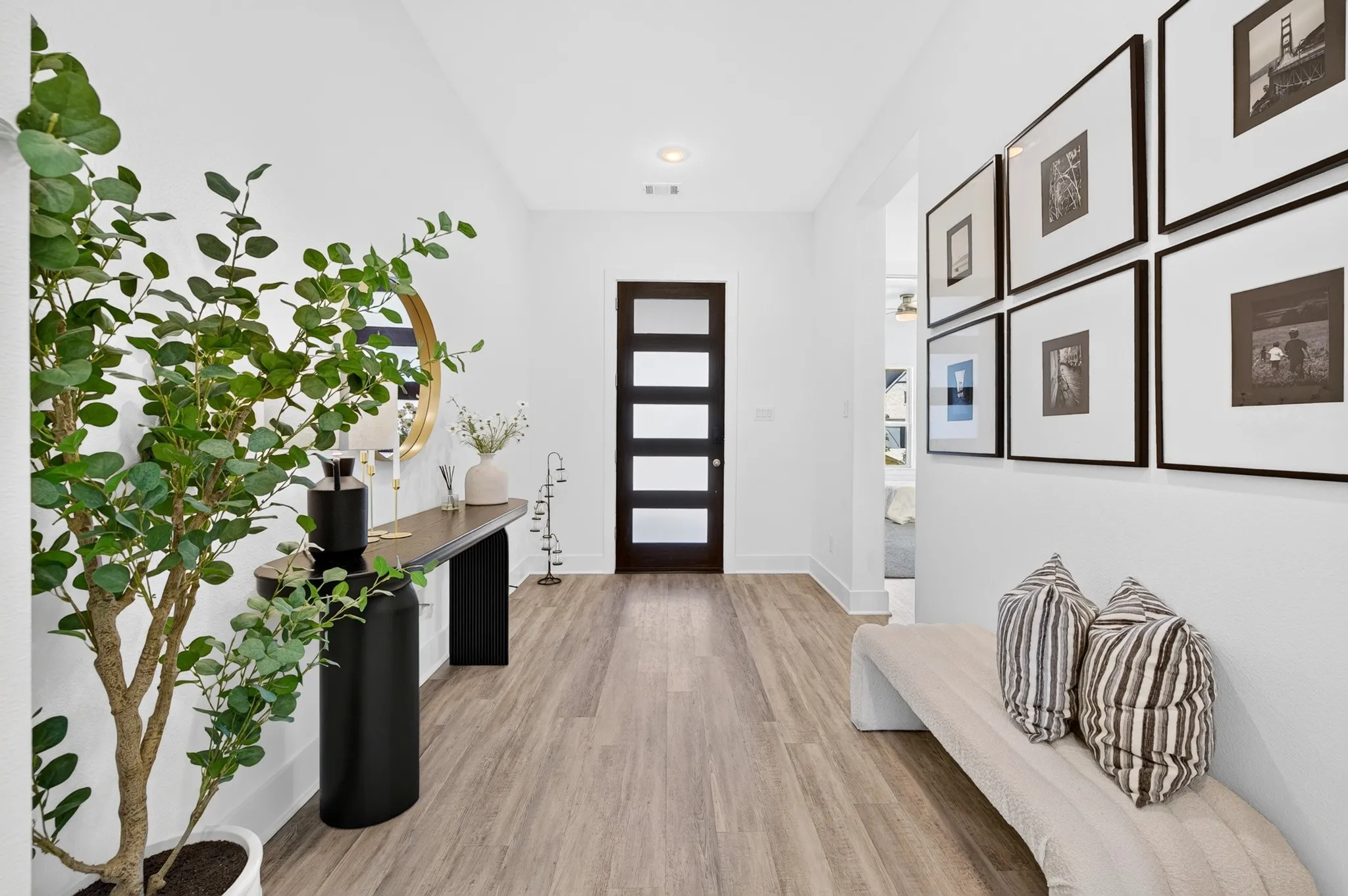 Wood-finish flooring throughout the entryway