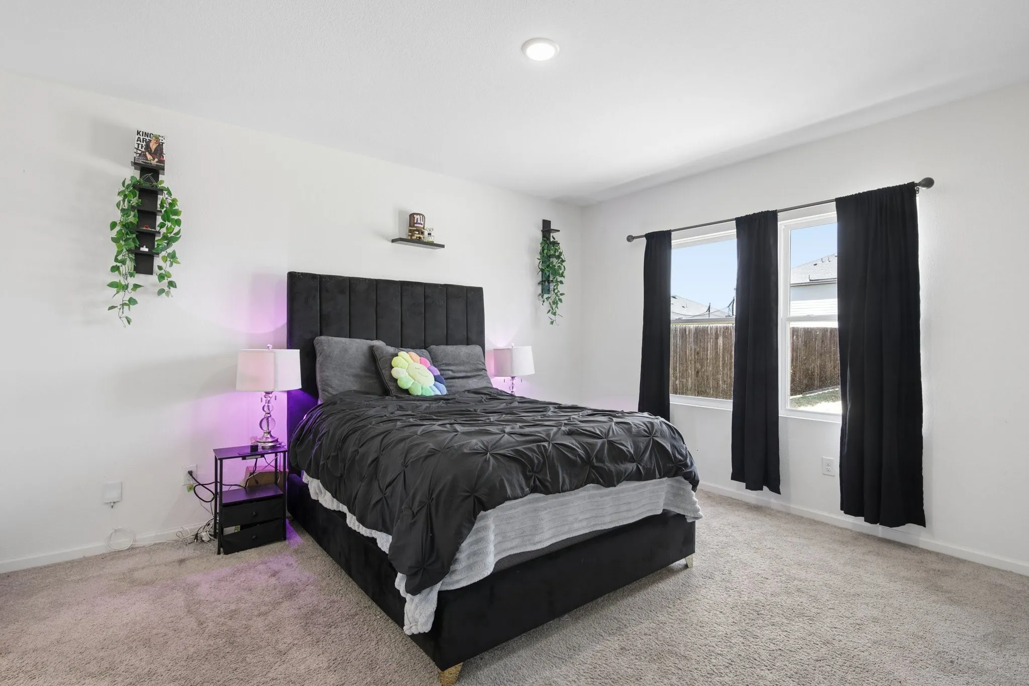 Primary bedroom is large and has carpet. Can fit a king sized bed