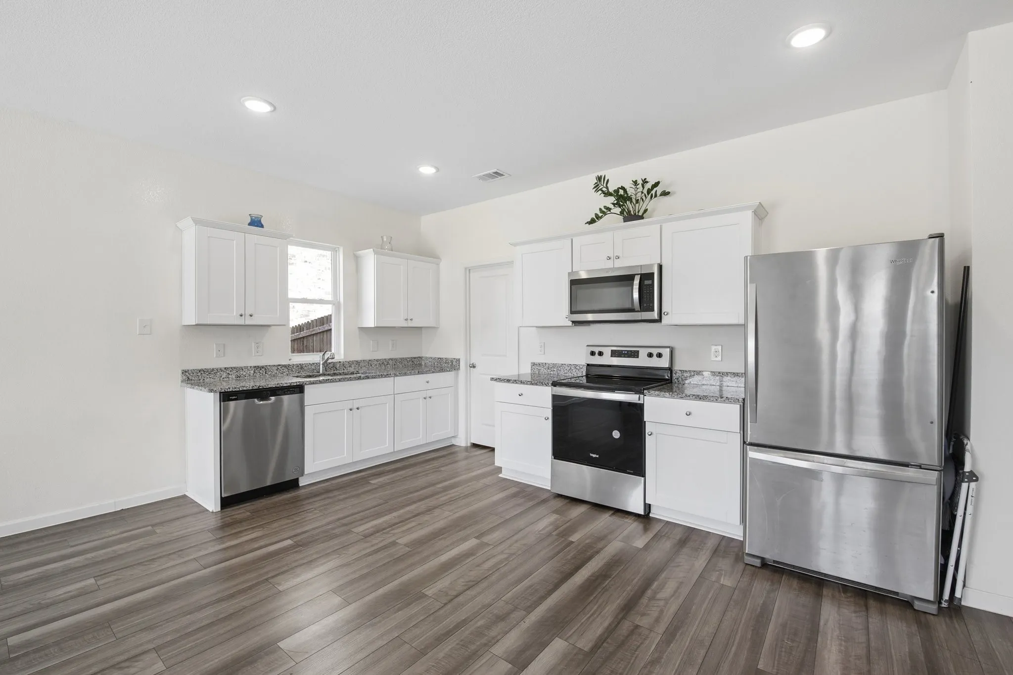 Stainless steel appliances, refrigerator stays!