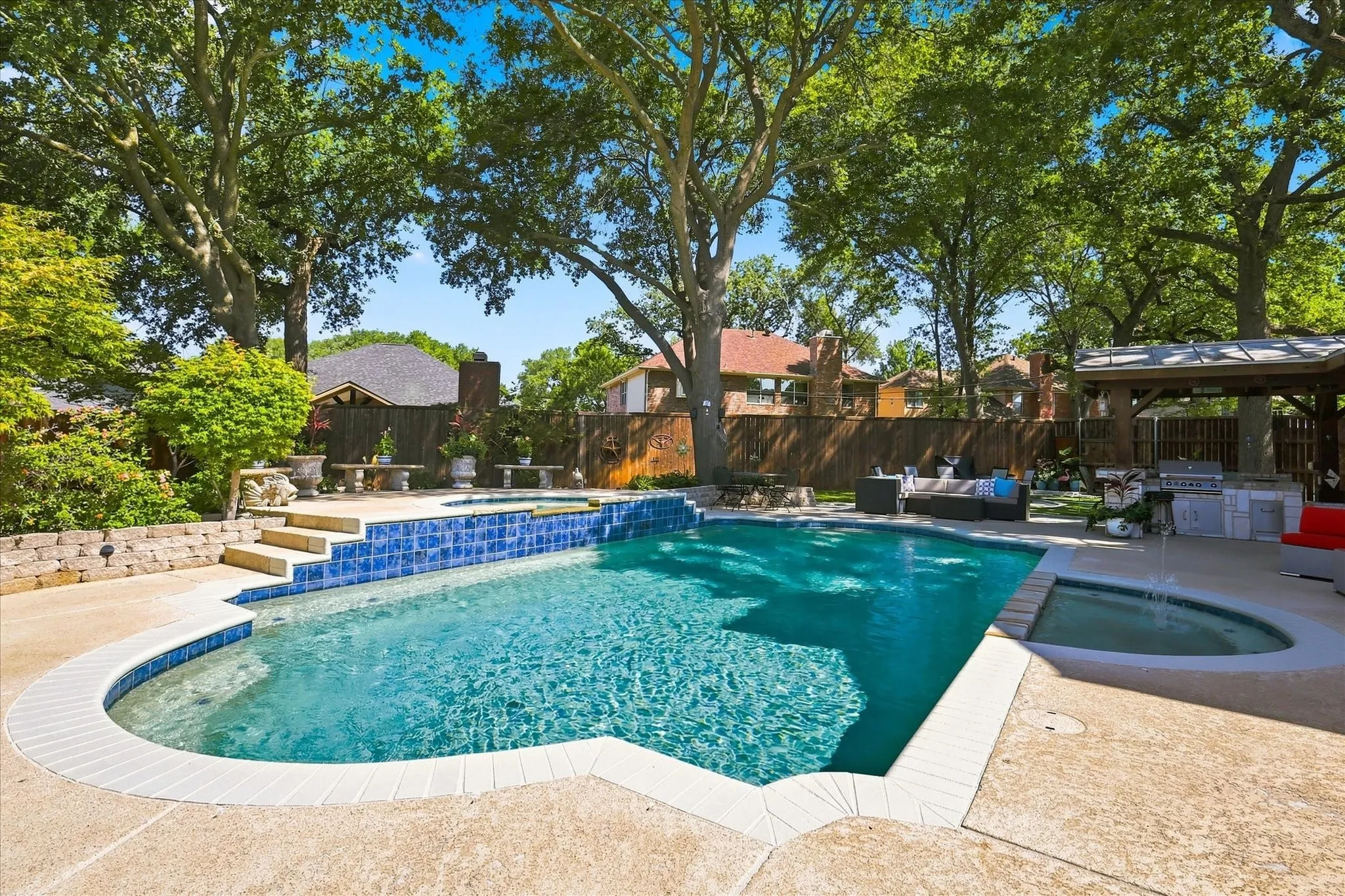 Sparkling pool, elevated spa, & kiddie pool.