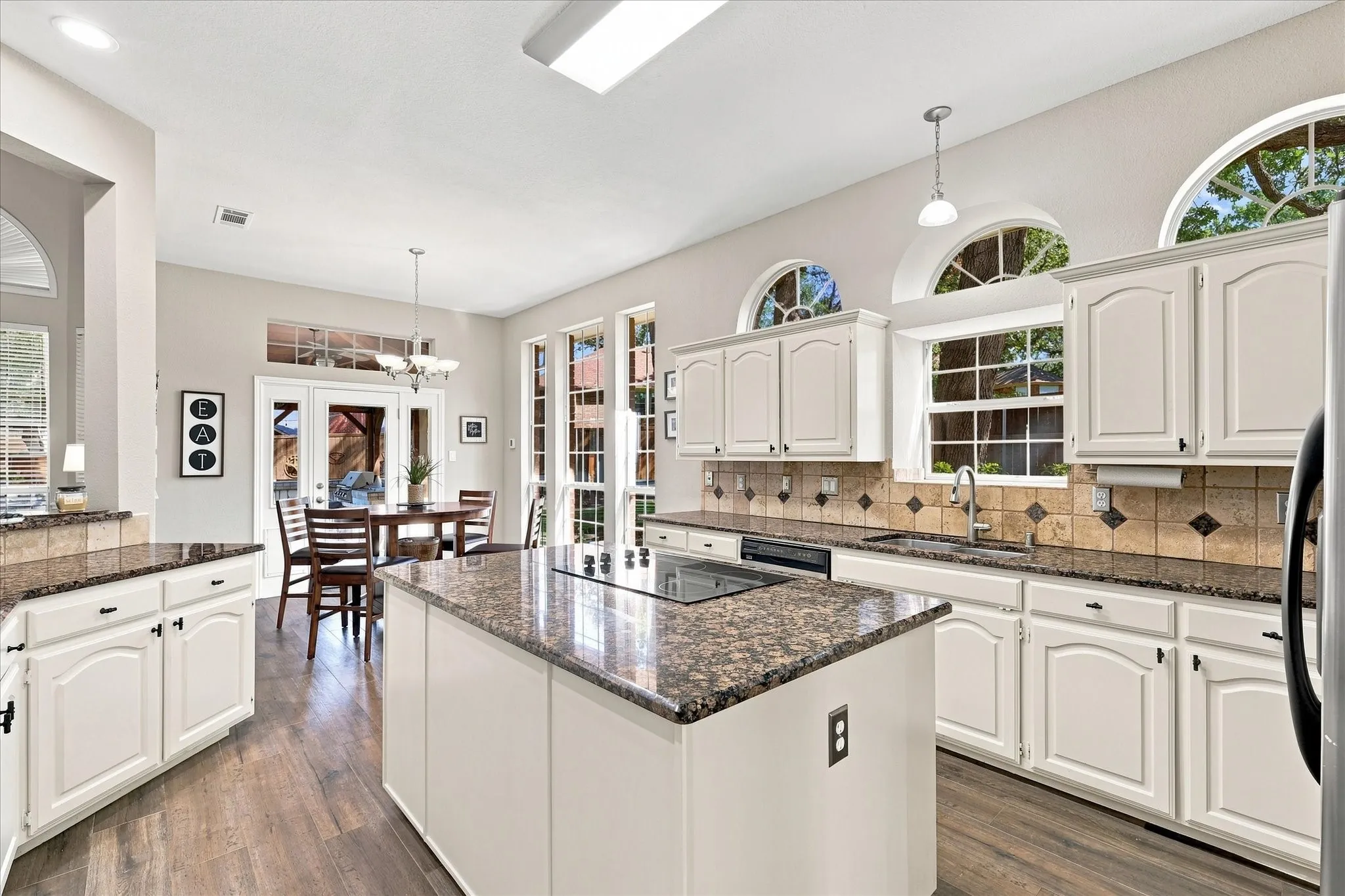 Island kitchen with granite countertops