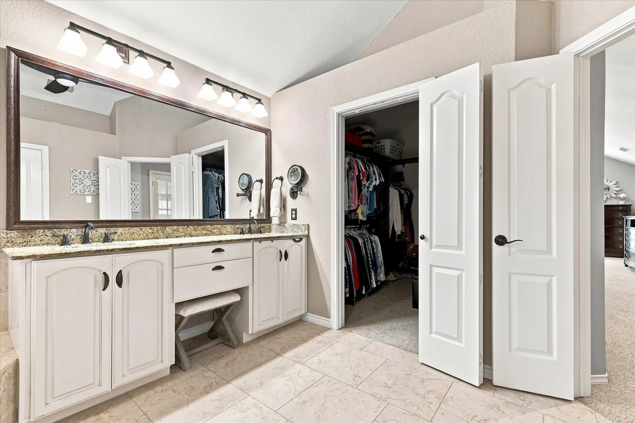 Custom walk-in closet in the primary