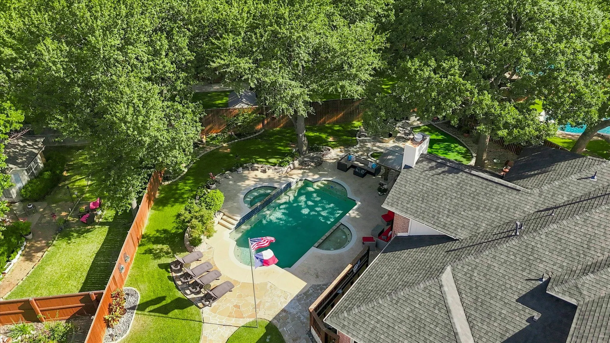 Oversized lot with stately Oak trees & multiple entertaining areas.