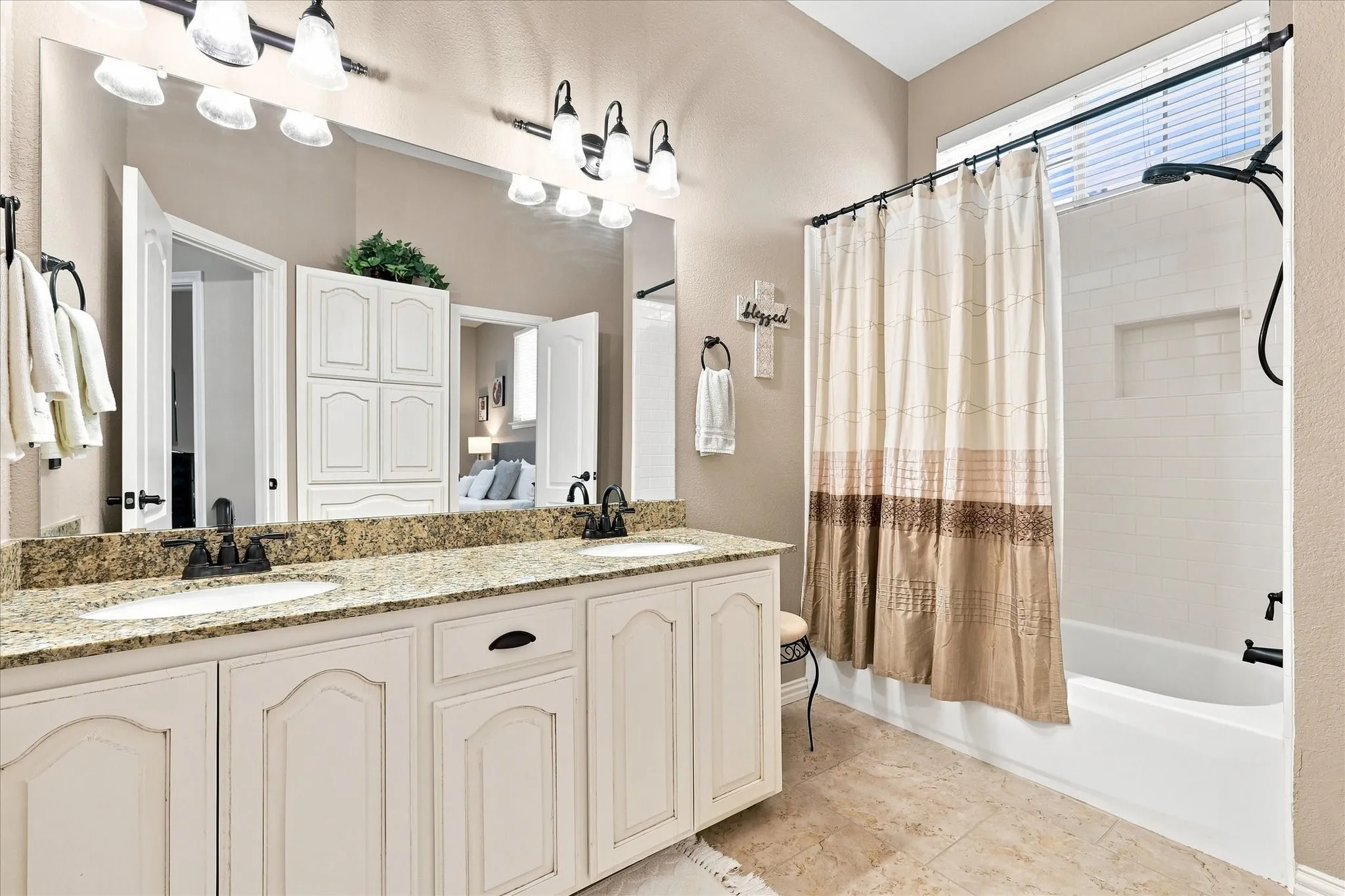 Full bath on main level is adjacent to the bedroom