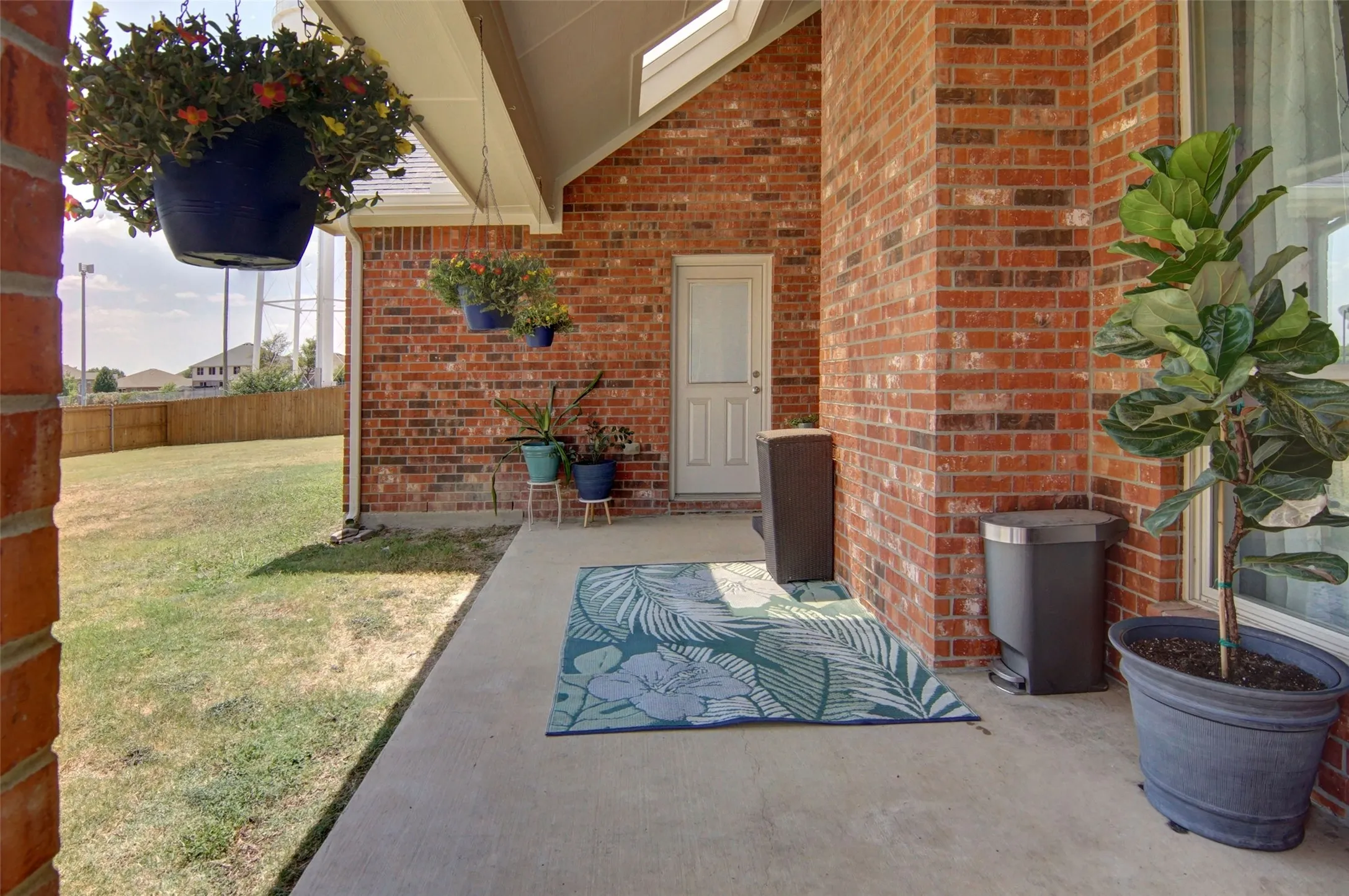 back porch has access from the kitchen area and the primary bedroom