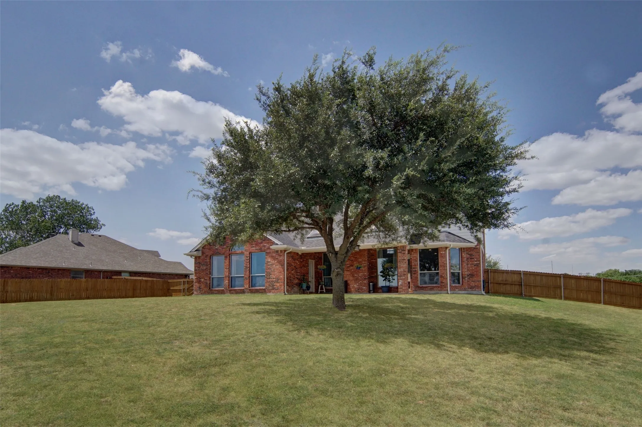 over one half acre with full privacy fence
