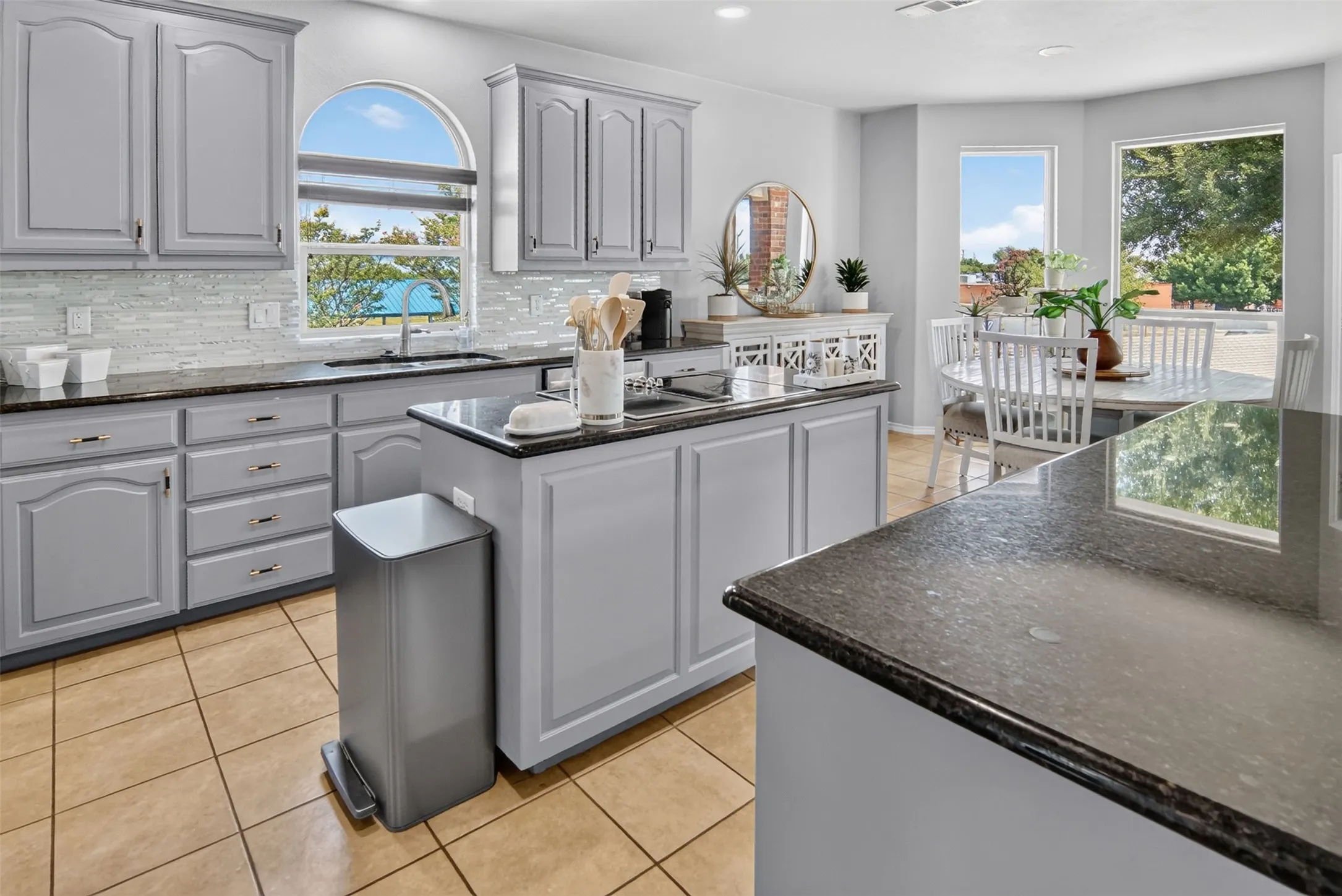 granite countertops, wonderful island, abundant counter space, eat in kitchen