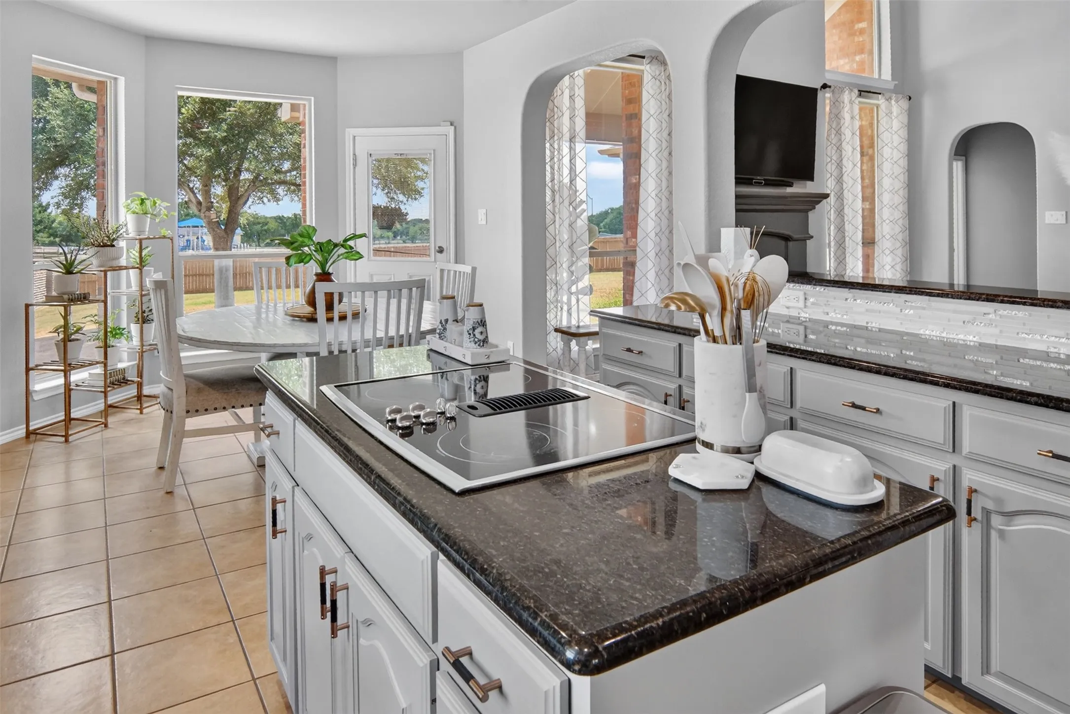 open to the living room, office, breakfast area, and great view of the backyard