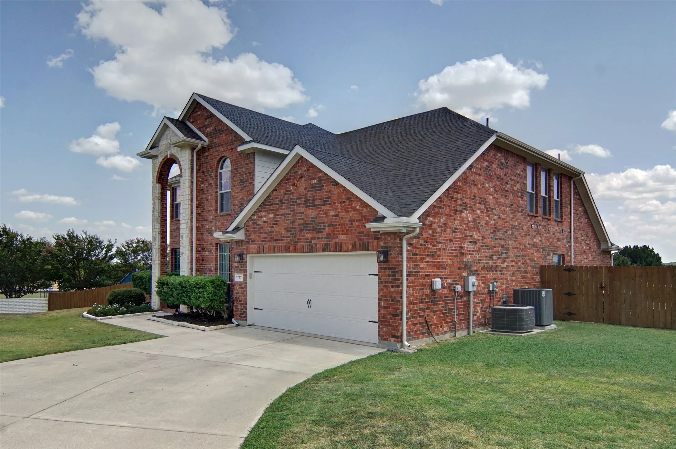 oversized 2 car garage with wide drive way