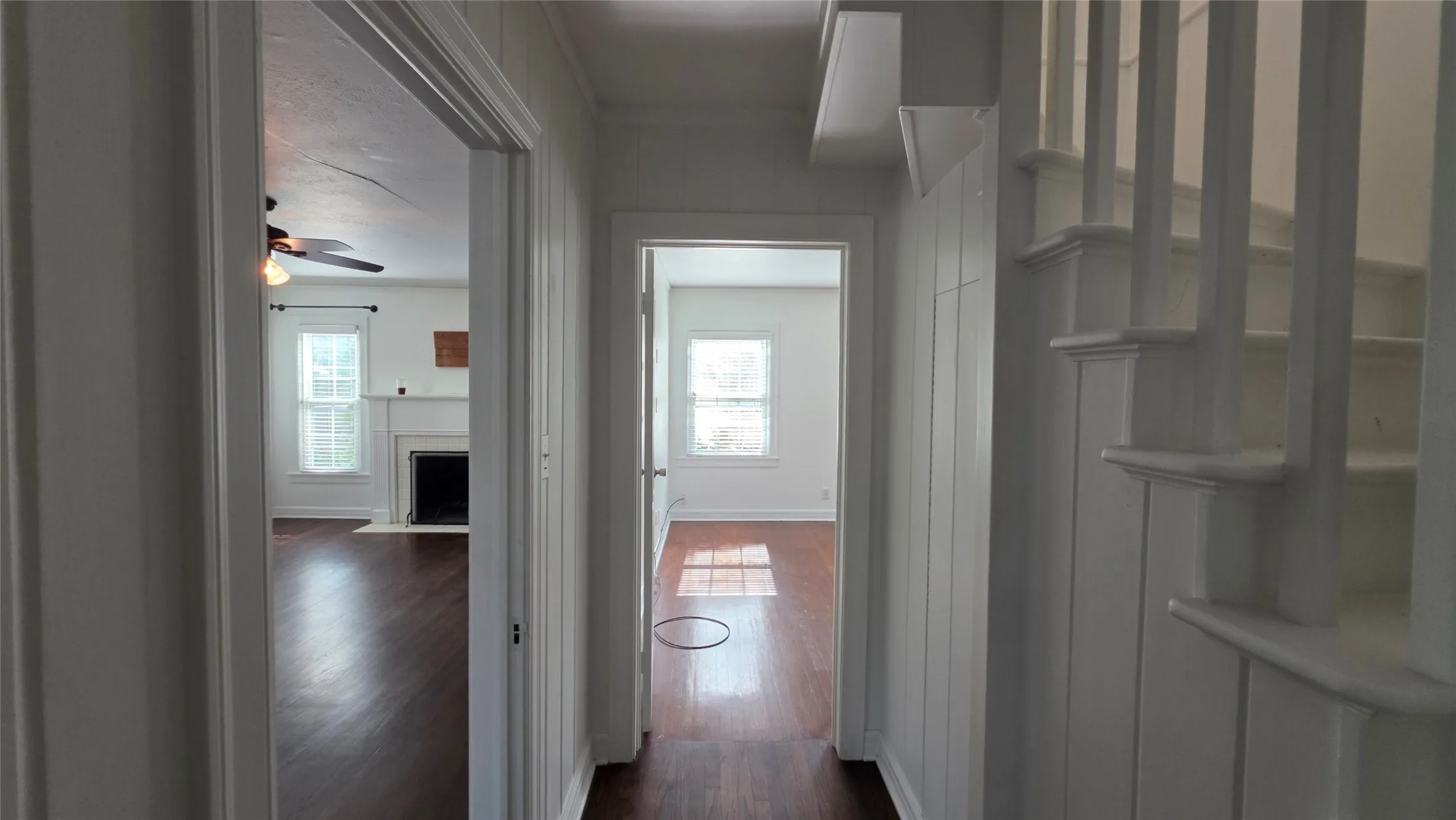 Hall to primary suite 1 of 2.