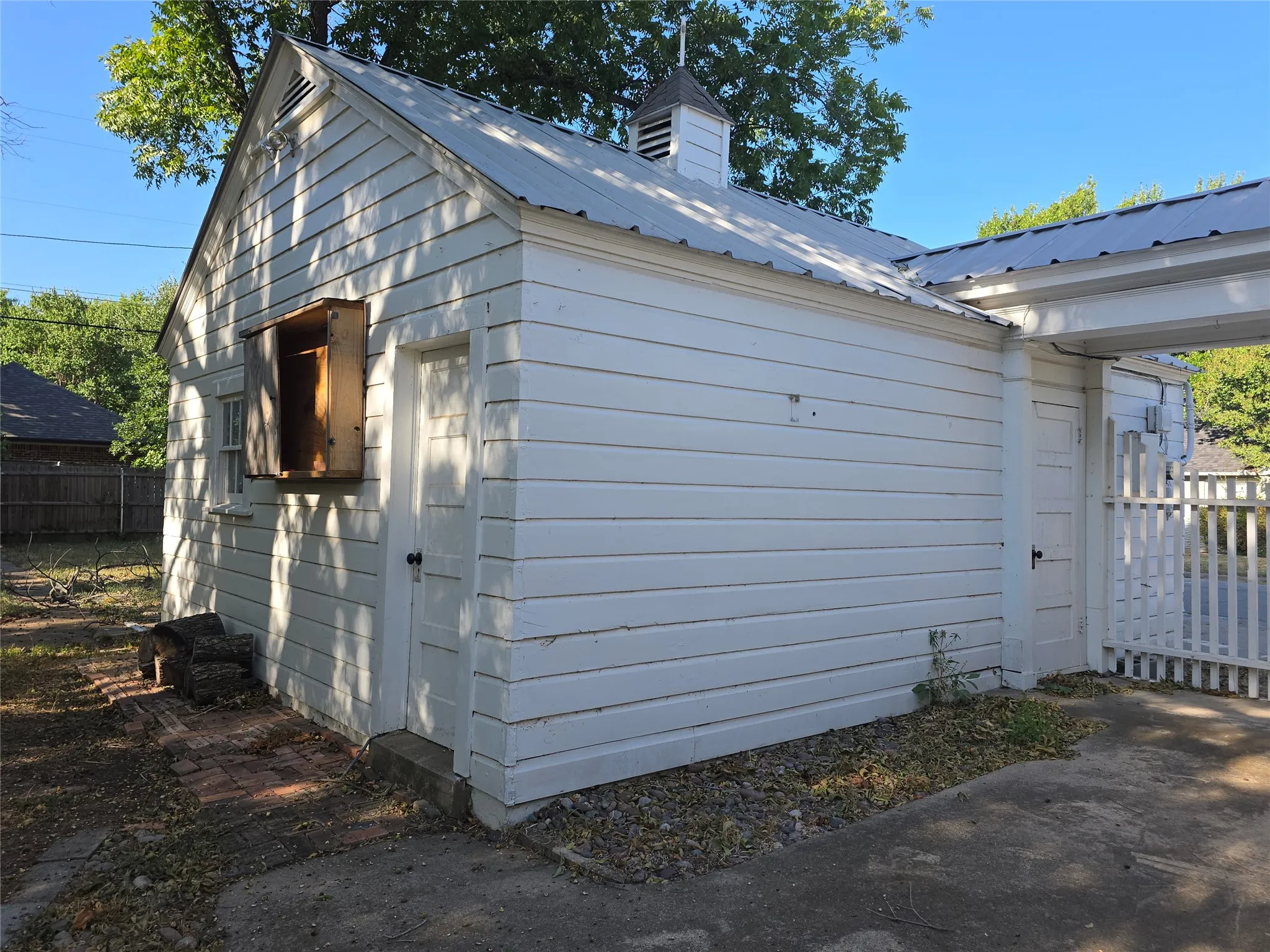 Detached garage has an additional storage area!