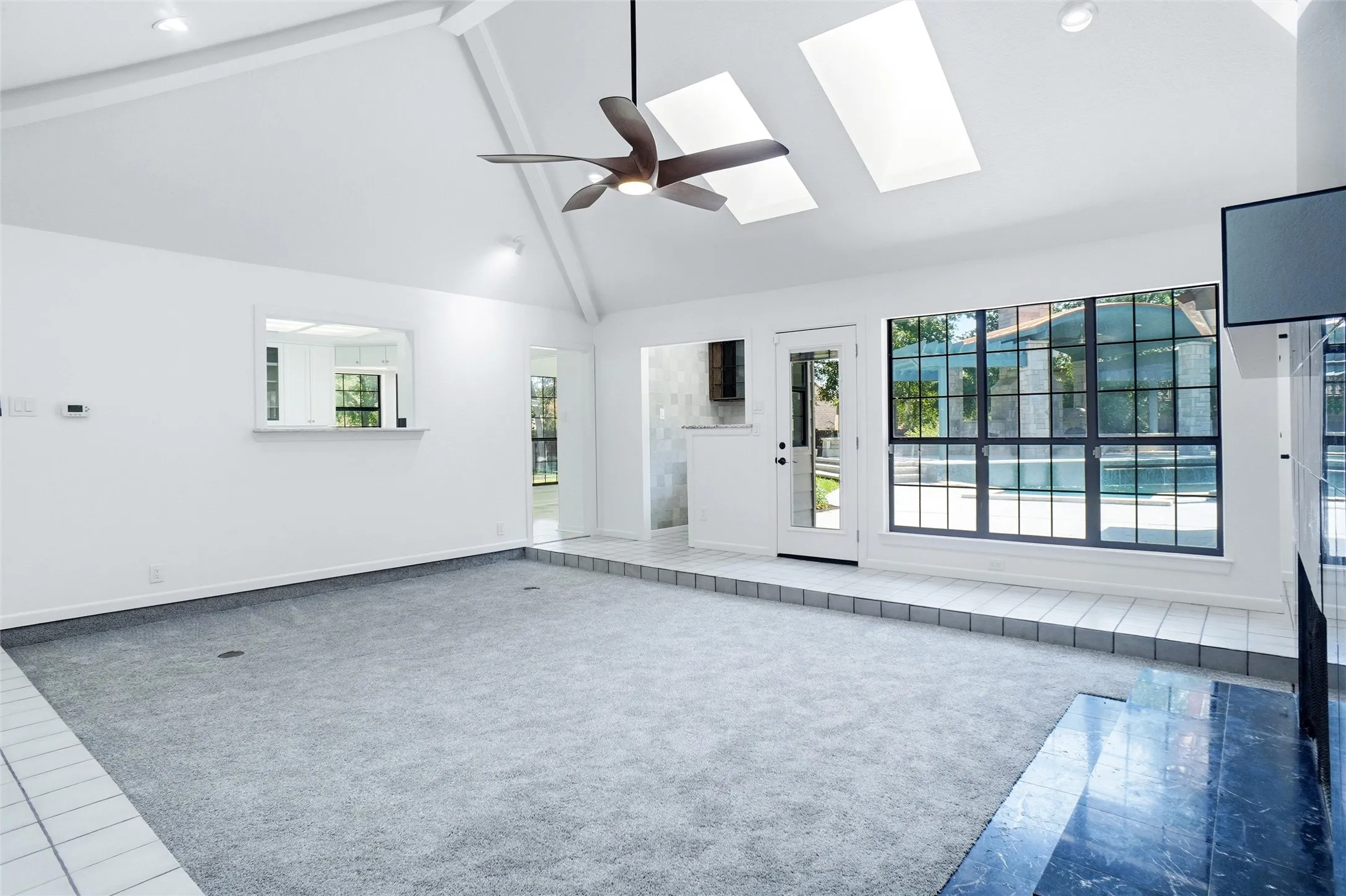 Light and Bright!   New carpet and paint.  Don't miss the  wet bar tucked in the corner!